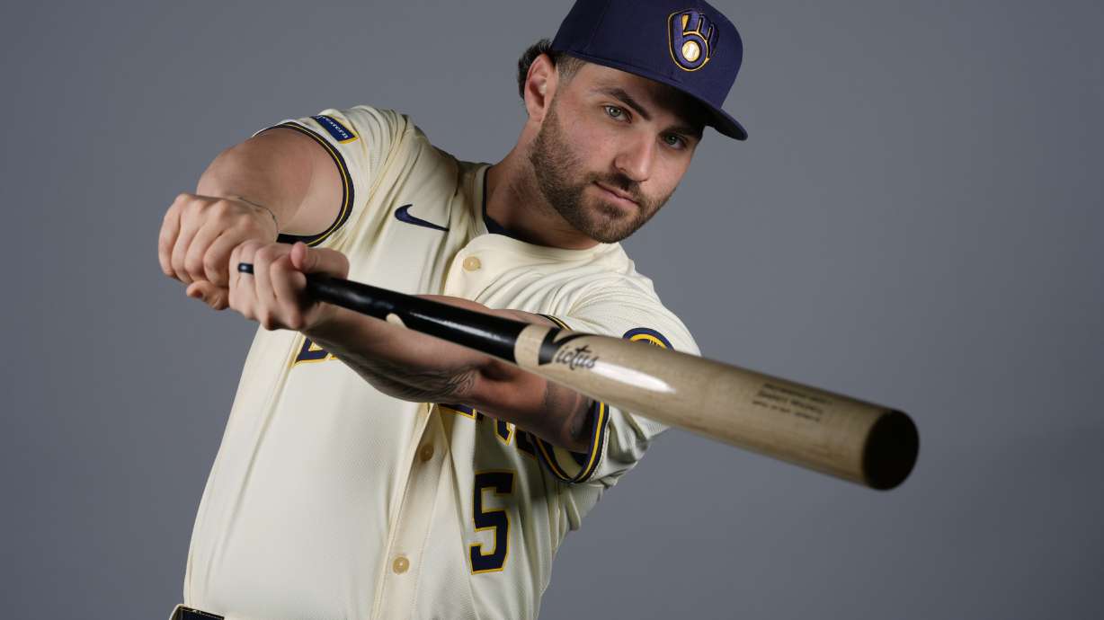 FILE Garrett Mitchell of the Milwaukee Brewers baseball team poses in Phoenix Thursday, Feb. 22, 2024. Brewers outfielder Garrett Mitchell has been activated from the injured list, clearing the way for him to make his season debut after missing three months with a fractured left index finger. The NL Central-leading Brewers also optioned infielder Tyler Black to Triple-A Nashville and designated infielder Owen Miller for assignment on Monday, July 1, before opening a four-game series at Colorado.