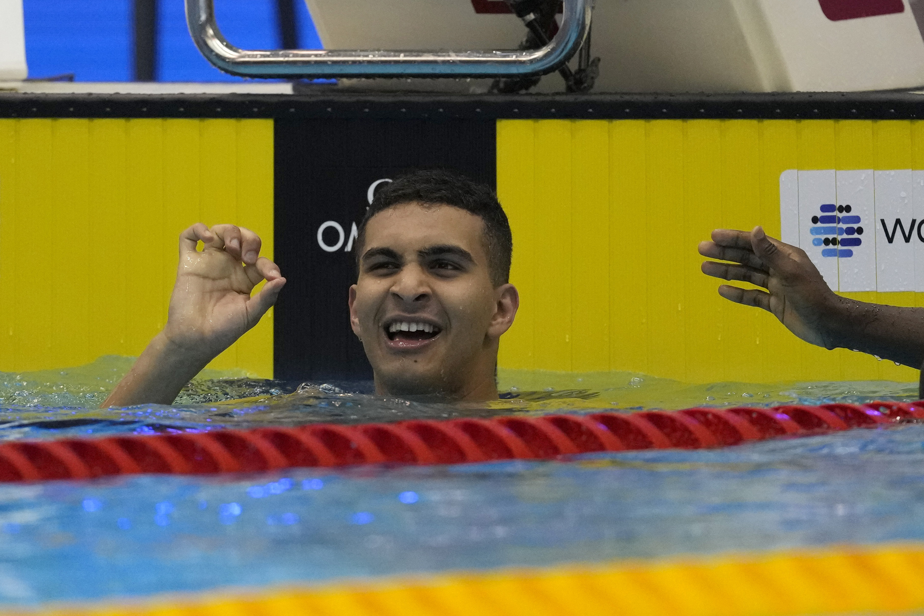 FILE - Palestinian swimmer Yazan Al Bawwab reacts during the men's 100m freestyle heats at the World Swimming Championships in Fukuoka, Japan, Wednesday, July 26, 2023. Six athletes, including one woman, were selected to represent Palestine at the Paris Olympics, an official from the Palestinian Olympic Committee told The Associated Press on Monday July 1, 2024.