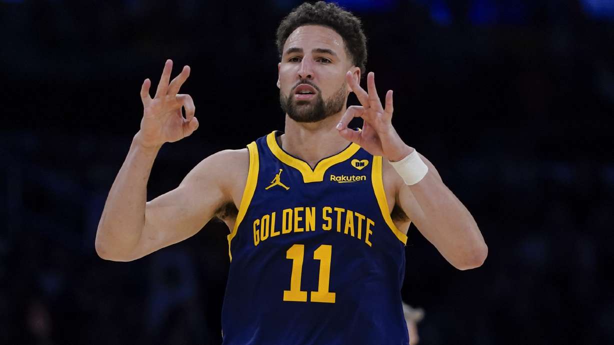 FILE - Golden State Warriors guard Klay Thompson gestures after making a 3-point basket against the Los Angeles Lakers during the second half of an NBA basketball game Tuesday, April 9, 2024, in Los Angeles. Klay Thompson is moving on from the Golden State Warriors, with the four-time league champion agreeing to join the Western Conference champion Dallas Mavericks and change franchises for the first time in his 13-year NBA career, two people with knowledge of the decision said Monday, July 1, 2024.