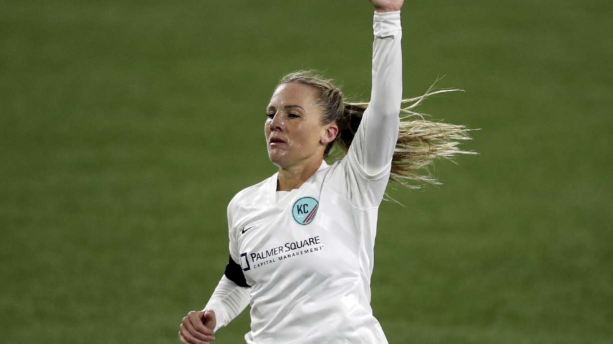 FILE - Kansas City's Amy Rodriguez reacts during an NWSL Challenge Cup soccer match against the Portland Thorns, April 9, 2021, in Portland, Ore. Utah Royals first-year coach Rodriguez was fired after less than a season leading the revived NWSL club. The move Sunday, June 30, 2024, was part of an organizational shakeup for the struggling team, which is 2-11-2 and in last place in the league.