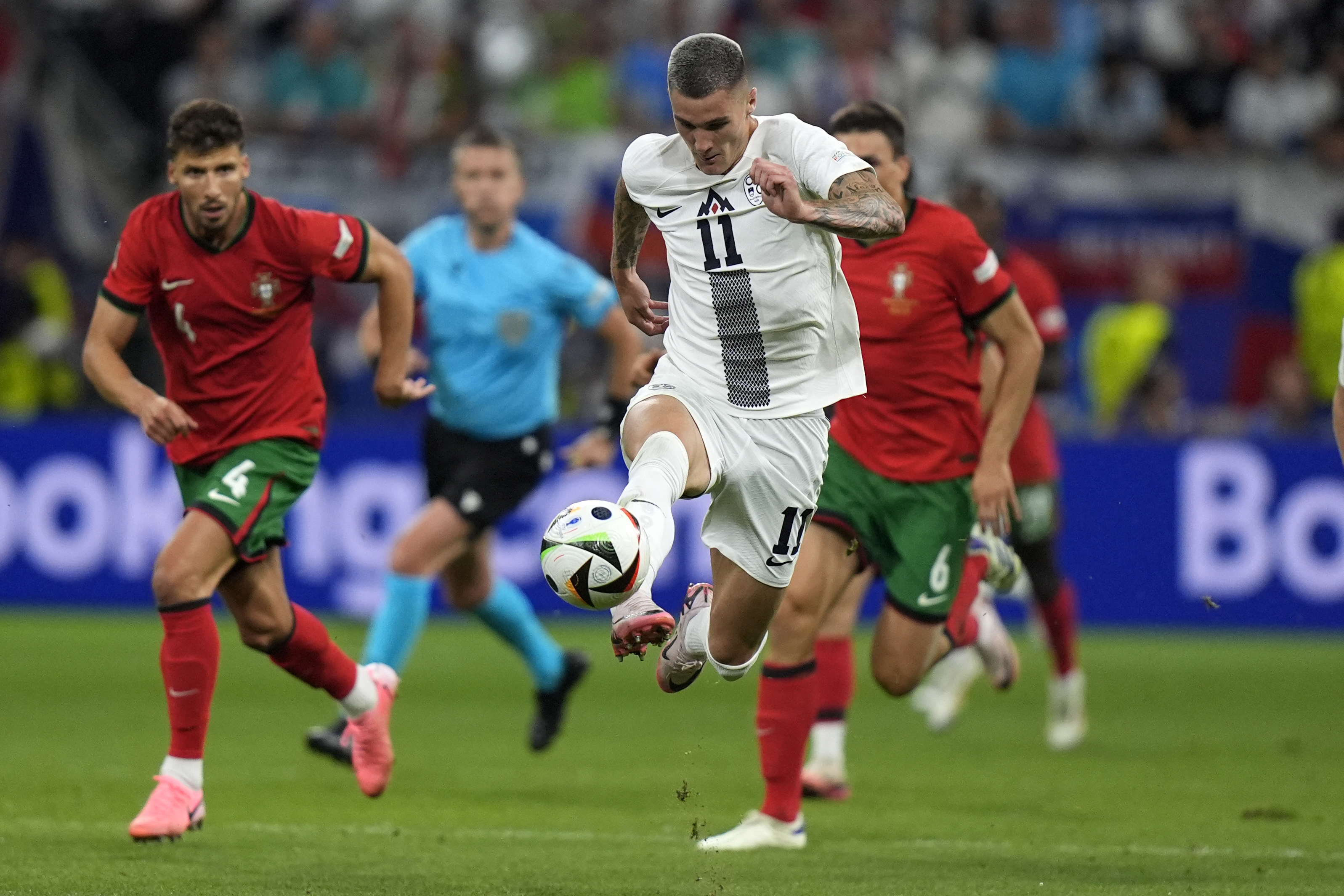 Slovenia's Benjamin Sesko controls the ball during a round of sixteen match between Portugal and Slovenia at the Euro 2024 soccer tournament in Frankfurt, Germany, Monday, July 1, 2024. 