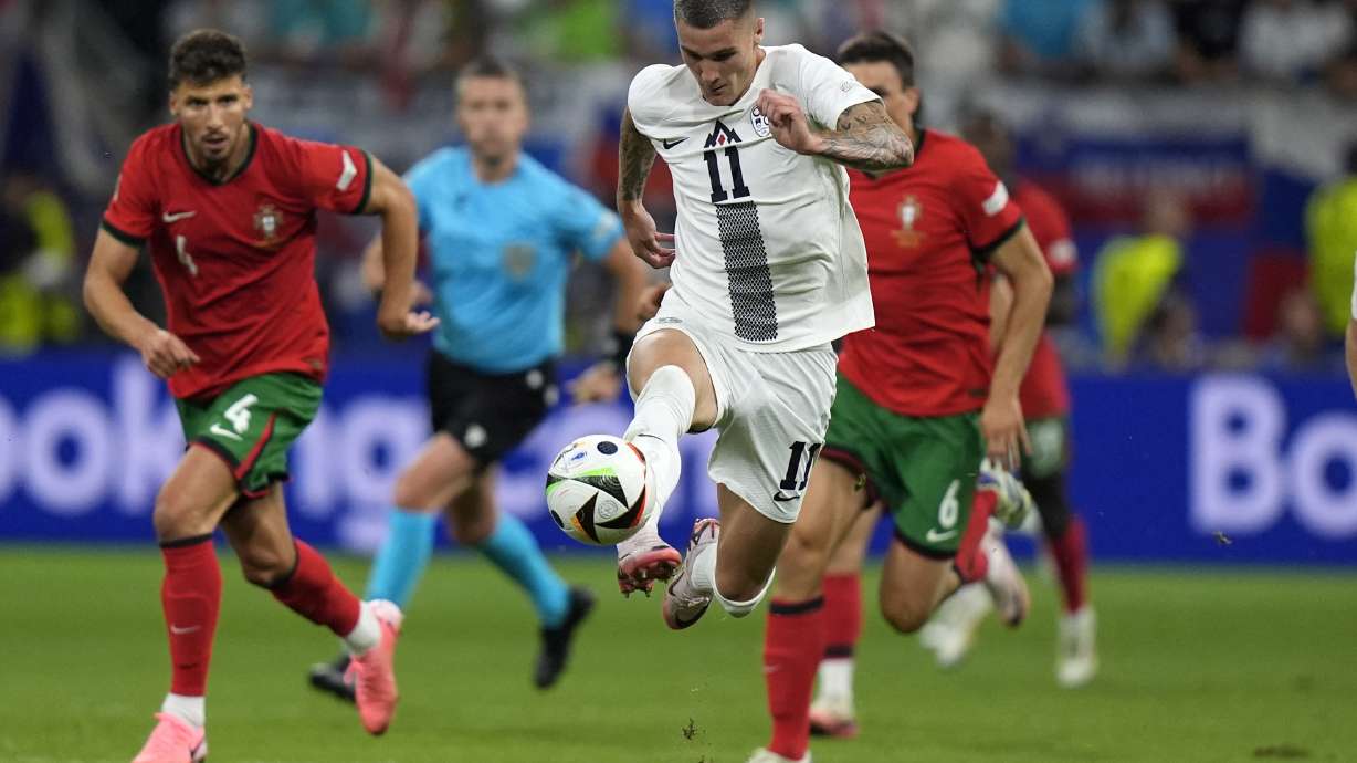 Slovenia's Benjamin Sesko controls the ball during a round of sixteen match between Portugal and Slovenia at the Euro 2024 soccer tournament in Frankfurt, Germany, Monday, July 1, 2024.