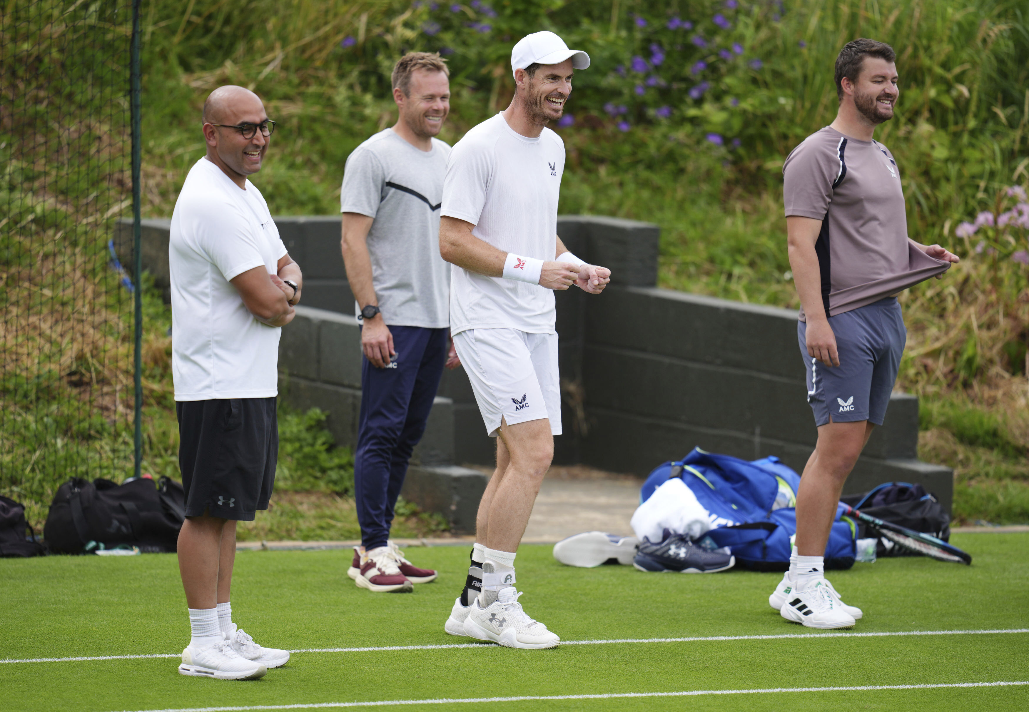 Britain's Andy Murray and his coaching team on the practice court at the All England Lawn Tennis and Croquet Club in Wimbledon, London, Saturday June 29, 2024. The Wimbledon Championships begin on July 1.