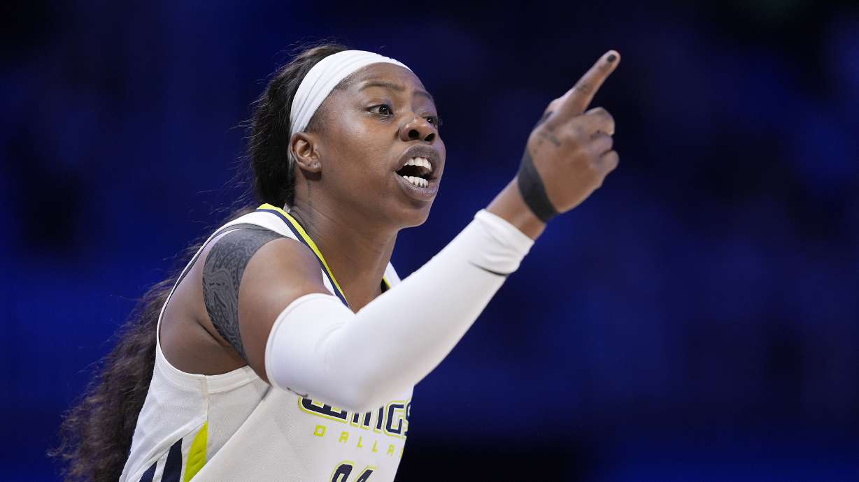 FILE - Dallas Wings' Arike Ogunbowale instructs teammates during a WNBA basketball game against the Minnesota Lynx in Arlington, Texas, June 27, 2024. The Wings were coming off their most successful season in Texas, with All-Star starters Satou Sabally and Ogunbowale among the core back from a team that made the WNBA semifinals. Sabally got hurt even before the season, the first of numerous injuries that have clipped the Wings, who are now just trying to hold on until the Olympic break.