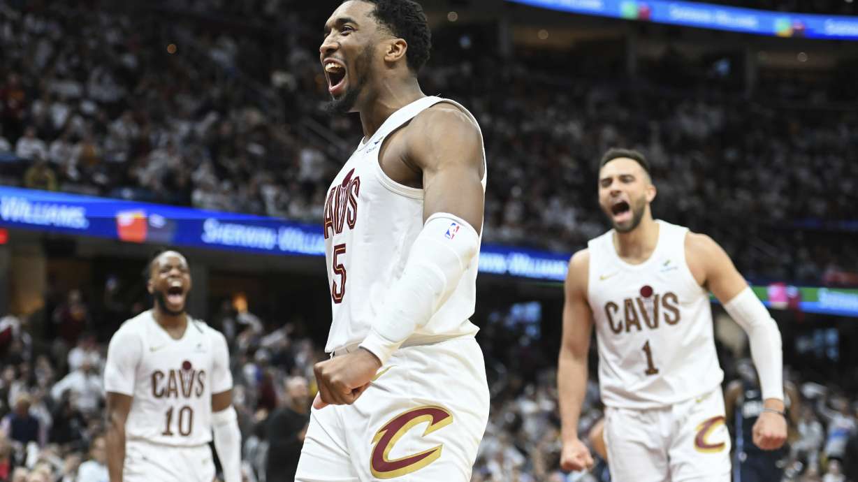 FILE - Cleveland Cavaliers' Donovan Mitchell (45) celebrates an offensive foul against the Orlando Magic during the second half in Game 1 of an NBA basketball first-round playoff series, April 20, 2024, in Cleveland. All-Star guard Donovan Mitchell has agreed to a three-year, $150.3 million contract extension with the Cleveland Cavaliers, a person familiar with the decision told the Associated Press on Tuesday, July 2.