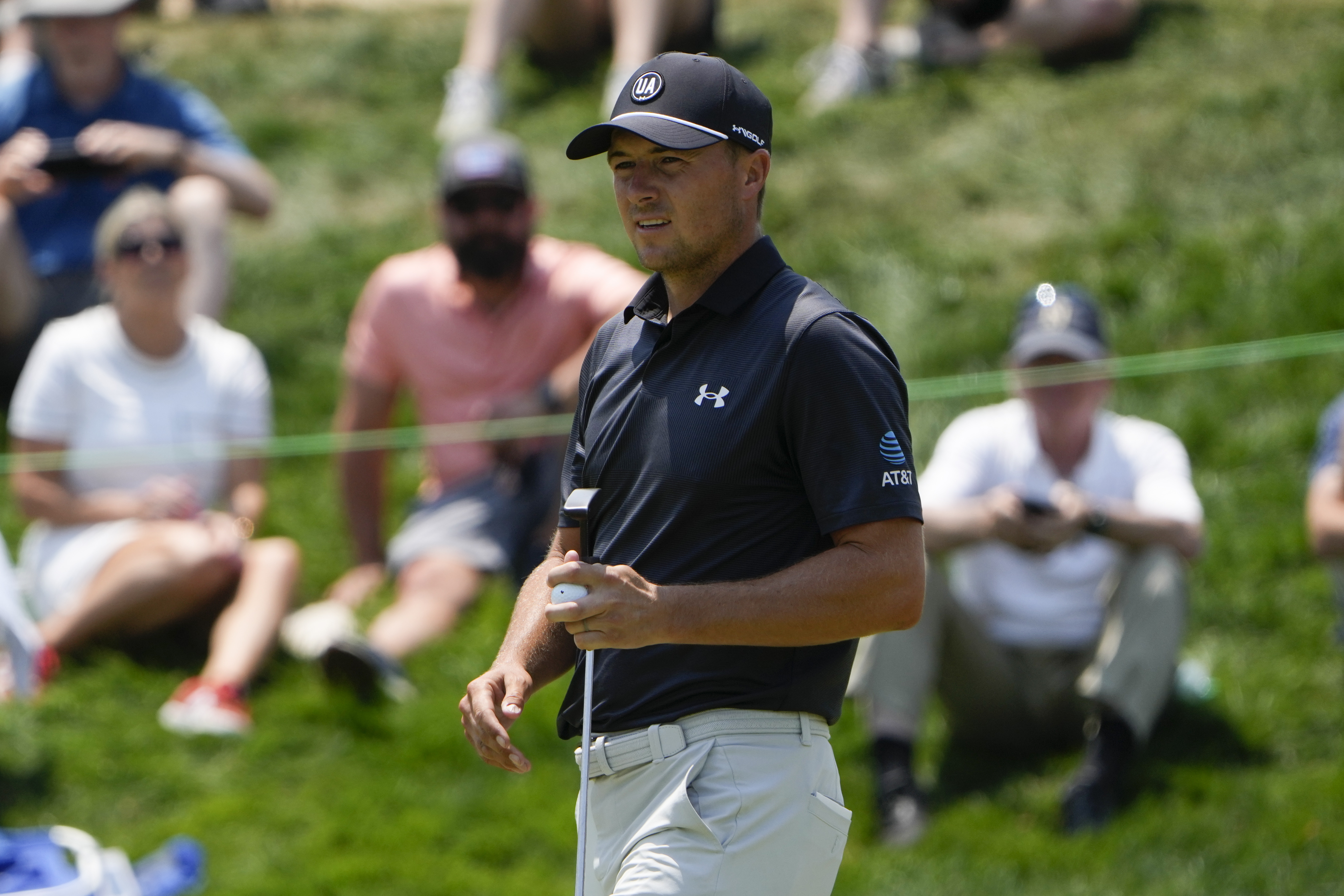 Jordan Spieth walks on the first green during the second round of the Travelers Championship golf tournament at TPC River Highlands, Friday, June 21, 2024, in Cromwell, Conn.