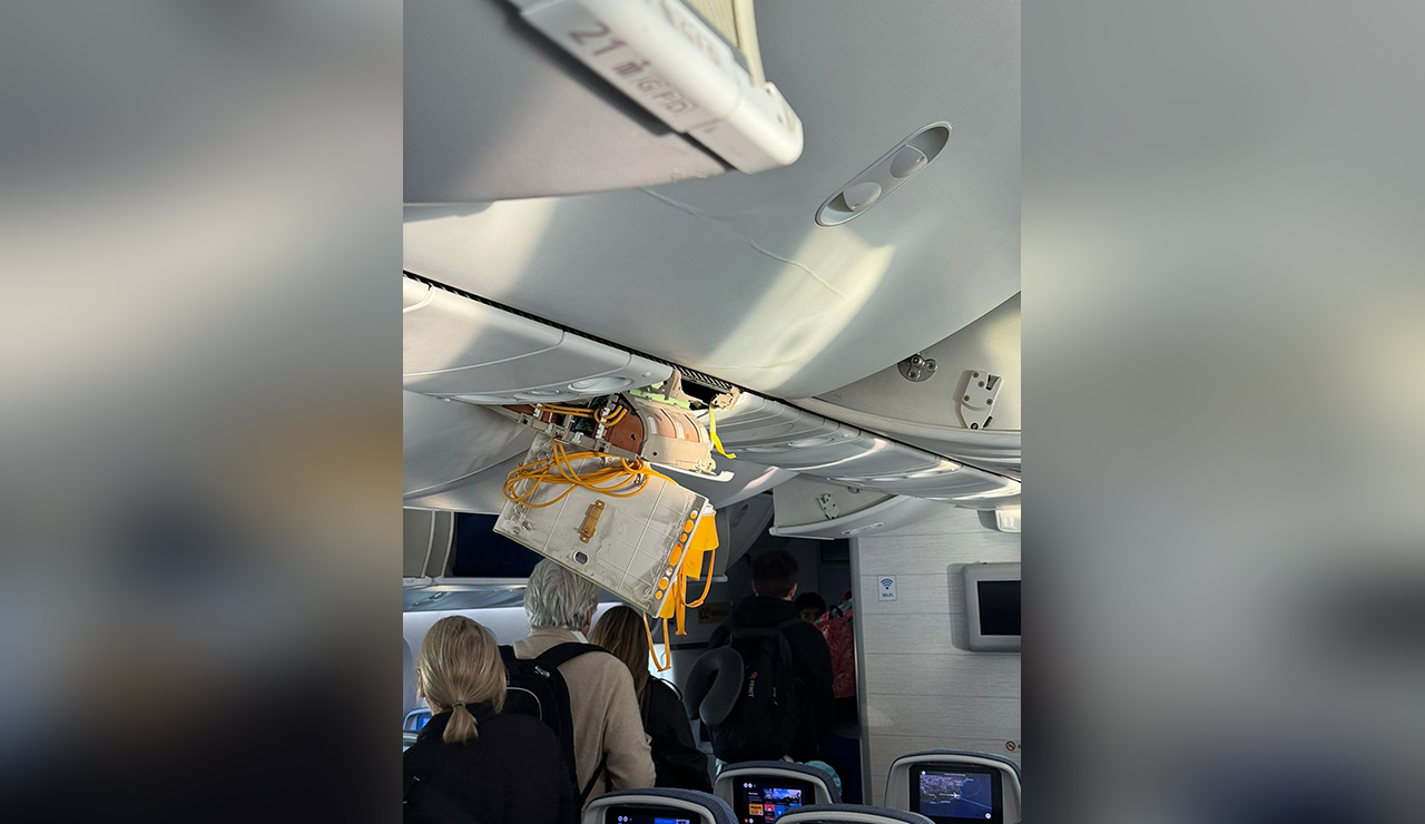 Damage inside an airplane is shown on an Air Europa flight that was forced to land in Brazil after it hit severe turbulence on Monday. Thirty passengers were injured.