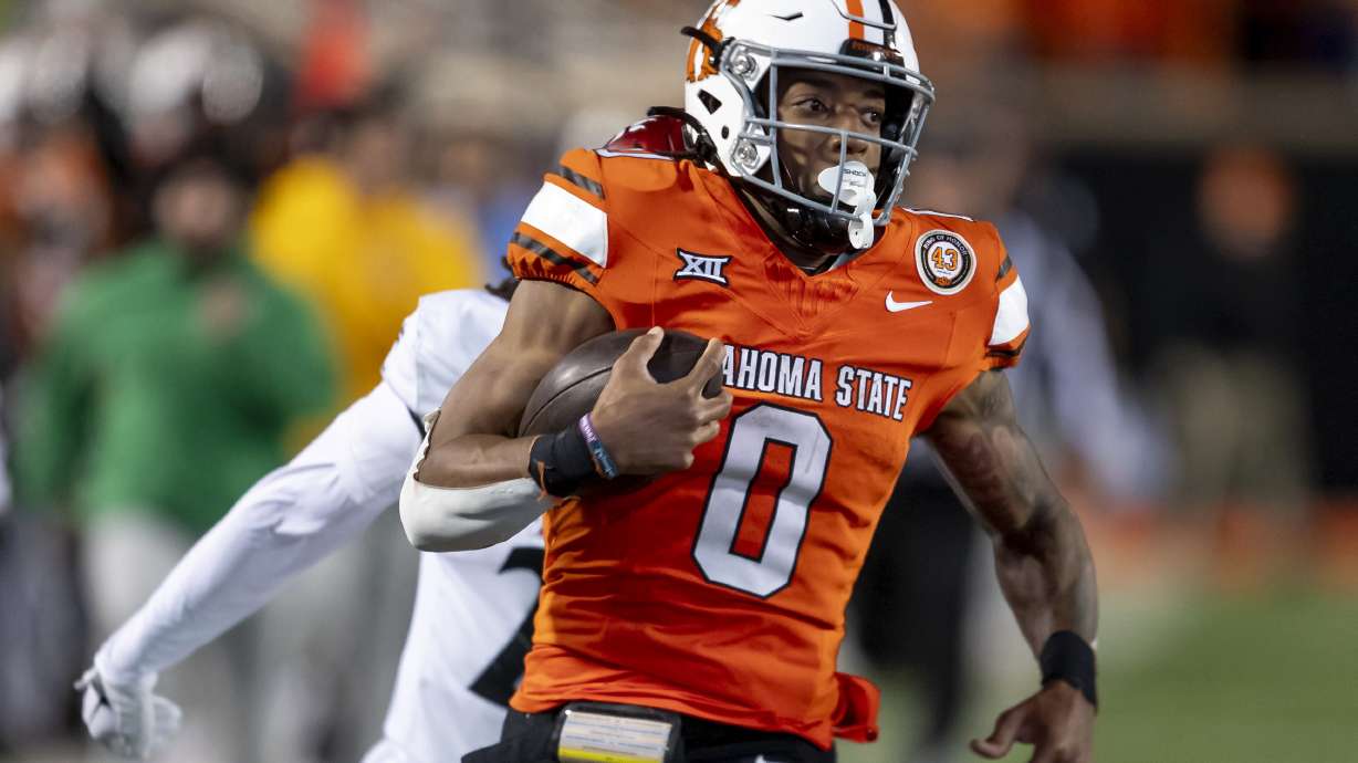 FILE - Oklahoma State running back Ollie Gordon II (0) runs for a touchdown during the second half of an NCAA college football game against Cincinnati Saturday, Oct. 28, 2023, in Stillwater, Okla. Gordon was arrested Sunday, June 30, 2024, morning under suspicion of driving under the influence.