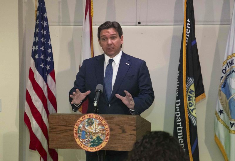 Florida Gov. Ron DeSantis speaks Feb. 29 in Palm Beach, Fla., just before signing a bill to release the transcripts of a 2006 grand jury investigation that looked into sex trafficking and rape allegations made against Jeffrey Epstein. On Monday, Florida Circuit Judge Luis Delgado released the grand jury transcripts.