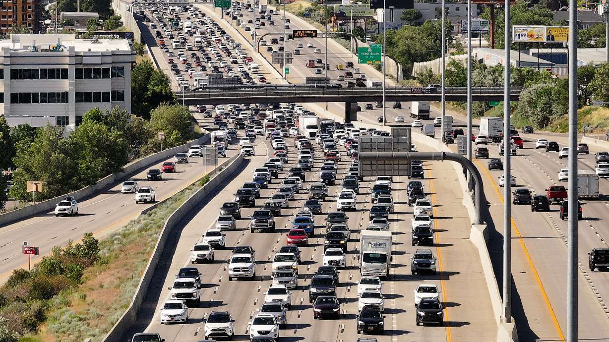 Motorists drive on I-15 in Salt Lake City on June 13. The Fourth of July lands on Thursday this year, which has travel experts expecting large travel numbers that are spread out over the unofficial holiday weekend.