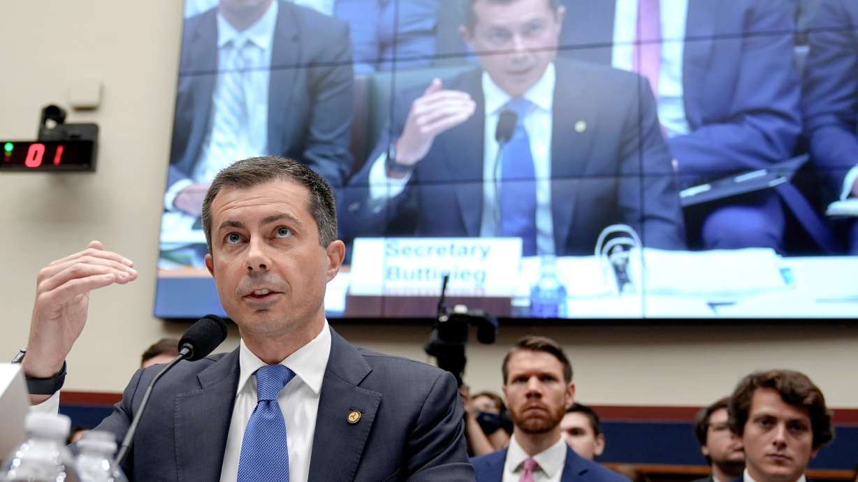 Transportation Secretary Pete Buttigieg, left, testifies during a House Committee on Transportation and Infrastructure oversight hearing of the Department of Transportation's policies and programs and fiscal year 2025 budget request, Thursday on Capitol Hill in Washington.