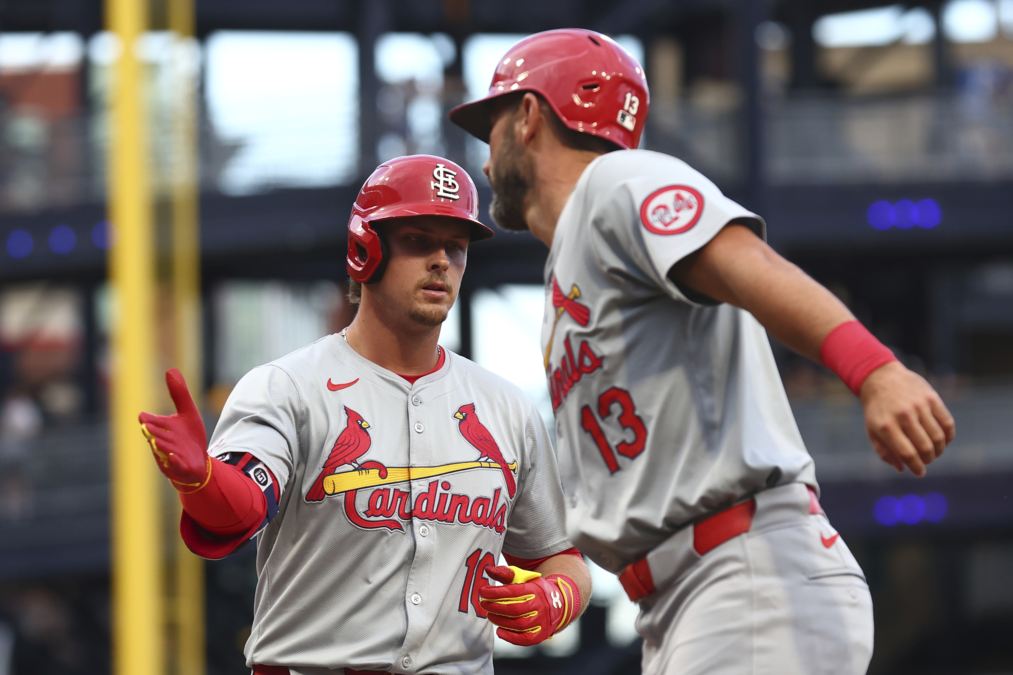 St. Louis Cardinals Nolan Gorman (16) reacts after hitting a grand slam home run against the Pittsburgh Pirates during a baseball game in Pittsburgh, Tuesday, July 2, 2024. 