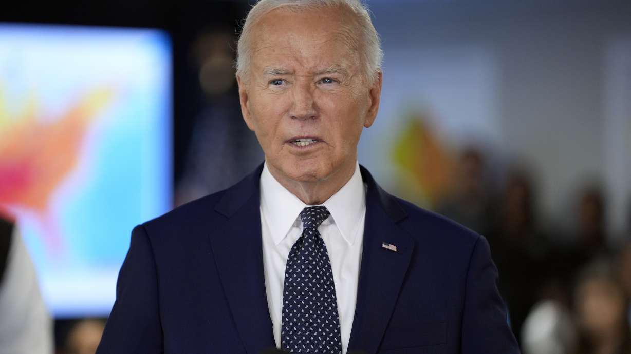 President Joe Biden speaks Tuesday in Washington. Two Union soldiers are posthumously receiving the Medal of Honor from Biden for conspicuous gallantry during the Civil War.