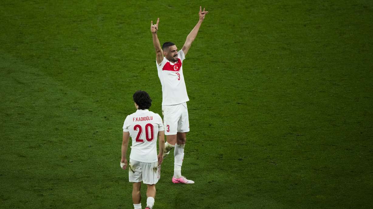 Turkey's Merih Demiral, right, celebrates after scoring his side second goal during a round of sixteen match between Austria and Turkey at the Euro 2024 soccer tournament in Leipzig, Germany, Tuesday, July 2, 2024.