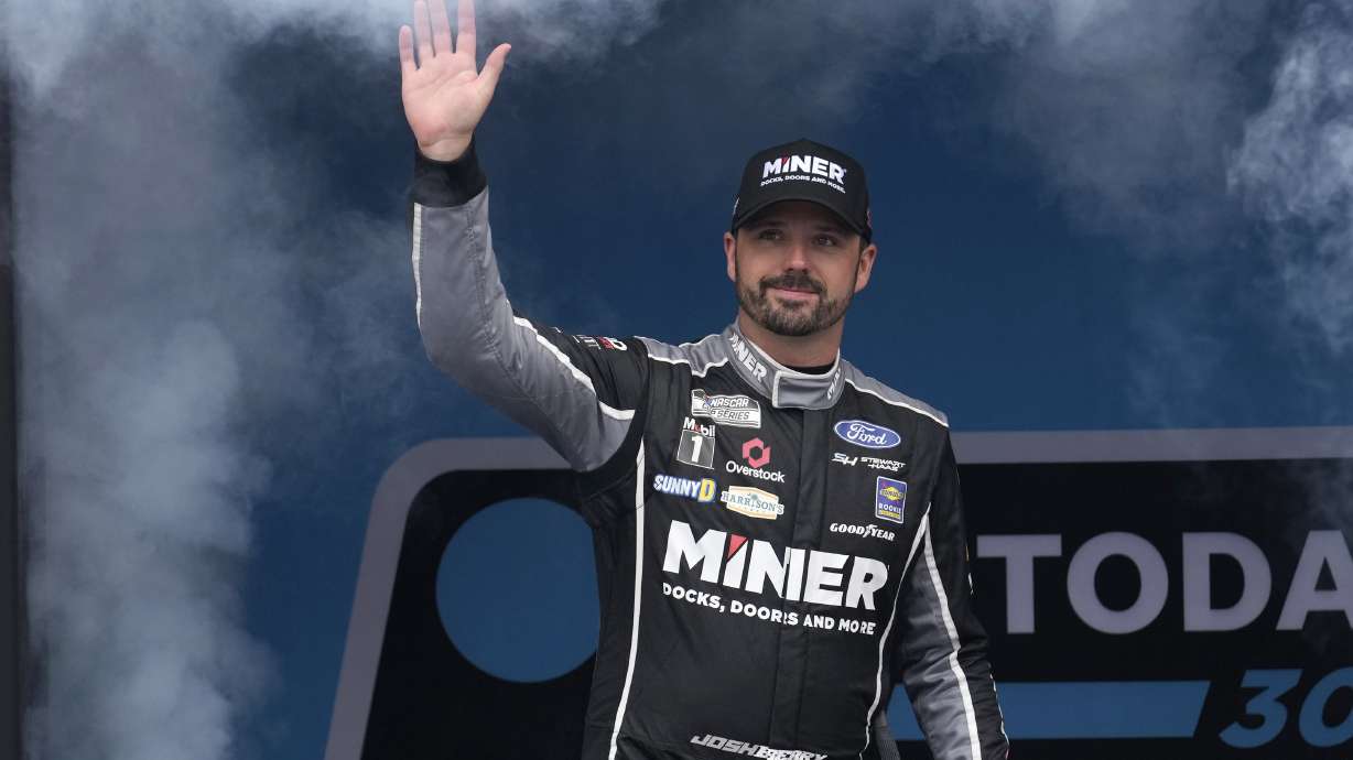 FILE - Josh Berry is introduced before a NASCAR Cup Series race, Sunday, June 23, 2024, at New Hampshire Motor Speedway, in Loudon, N.H. NASCAR Cup Series rookie Josh Berry has signed to drive the Wood Brothers' No. 21 car next season after the shuttering of his current Stewart-Haas Racing team. The announcement came Wednesday, July 3.