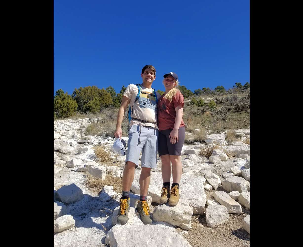 Sterling and Erica Lewis Bradshaw pose atop the Snow College "S" in Ephraim. Erica Bradshaw has hiked 77 of 83 mountainside letters in the state.