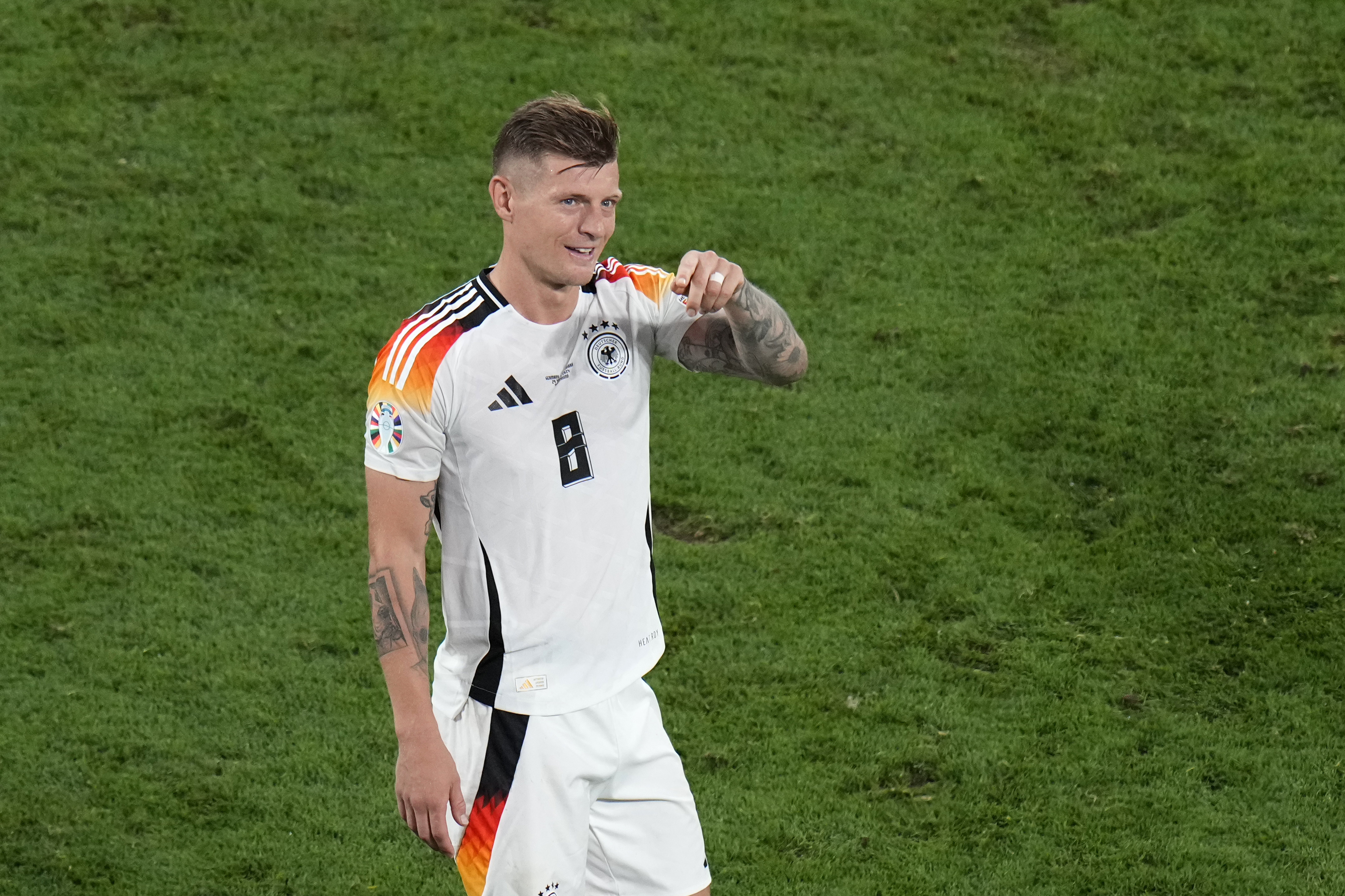 Germany's Toni Kroos applauds fans at the end of the round of sixteen match between Germany and Denmark at the Euro 2024 soccer tournament in Dortmund, Germany, Saturday, June 29, 2024. 