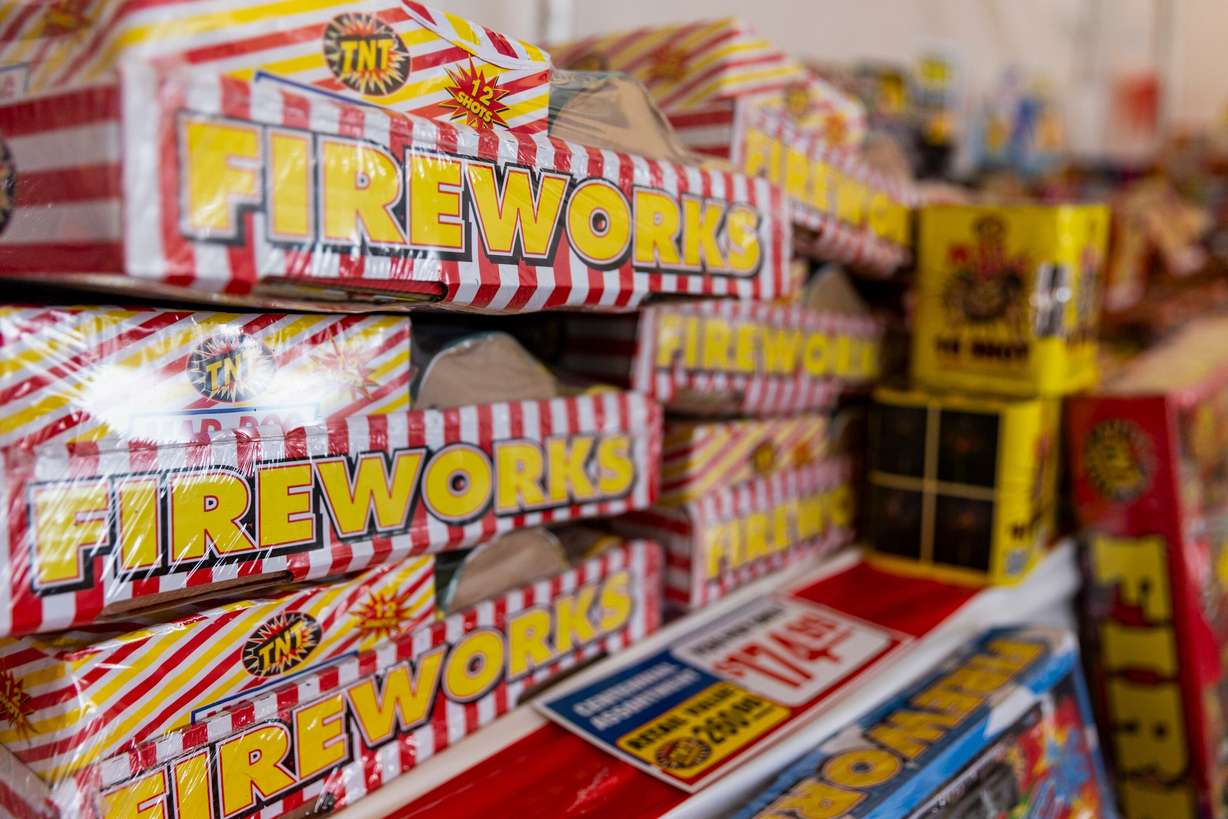 Stacks of fireworks are seen in a TNT tent on Redwood Road in Salt Lake City on Monday.
