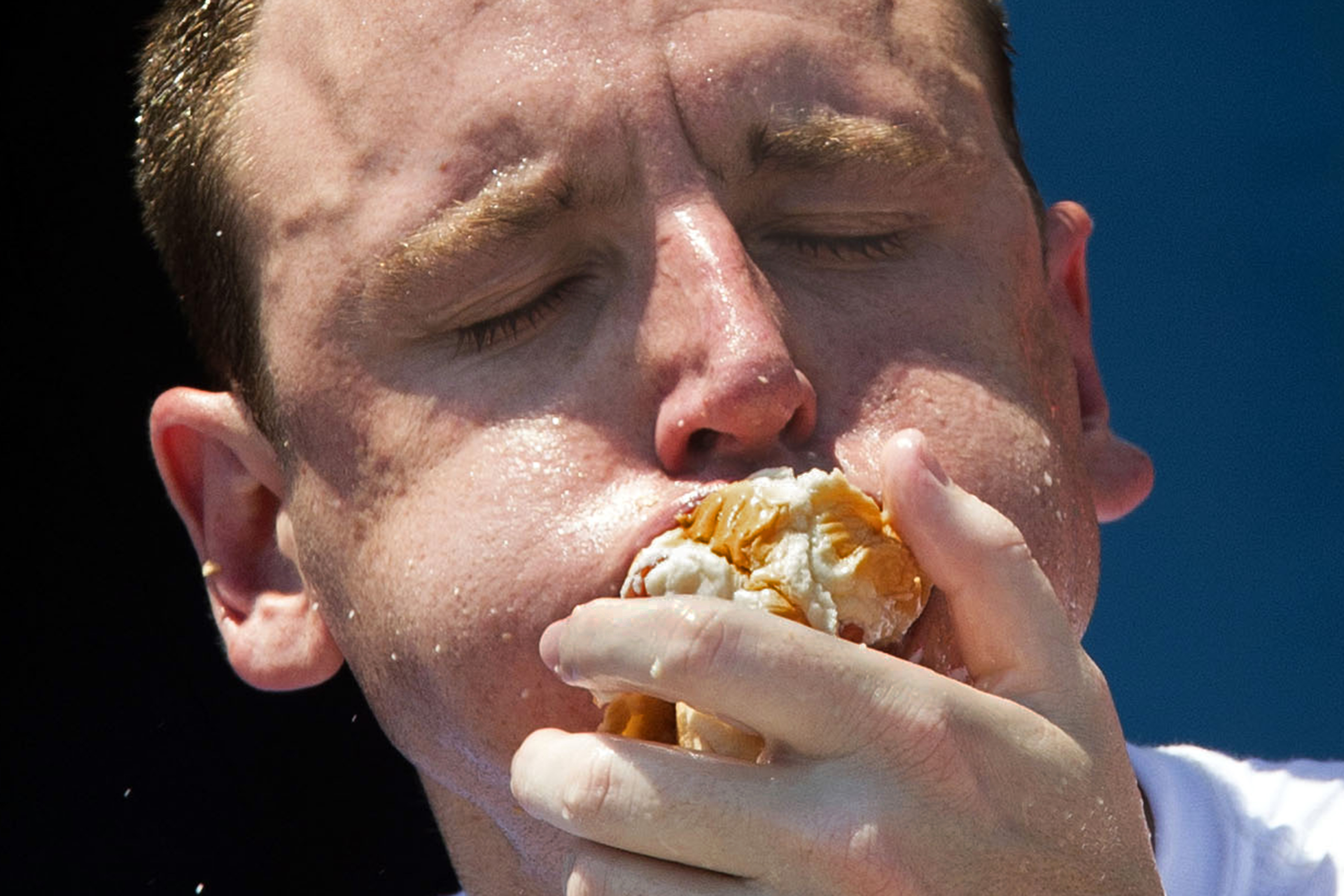 Five-time reigning champion Joey Chestnut competes in the Nathan's Famous Hot Dog Eating World Championship on July 4, 2012, in the Coney Island section of the Brooklyn borough of New York.