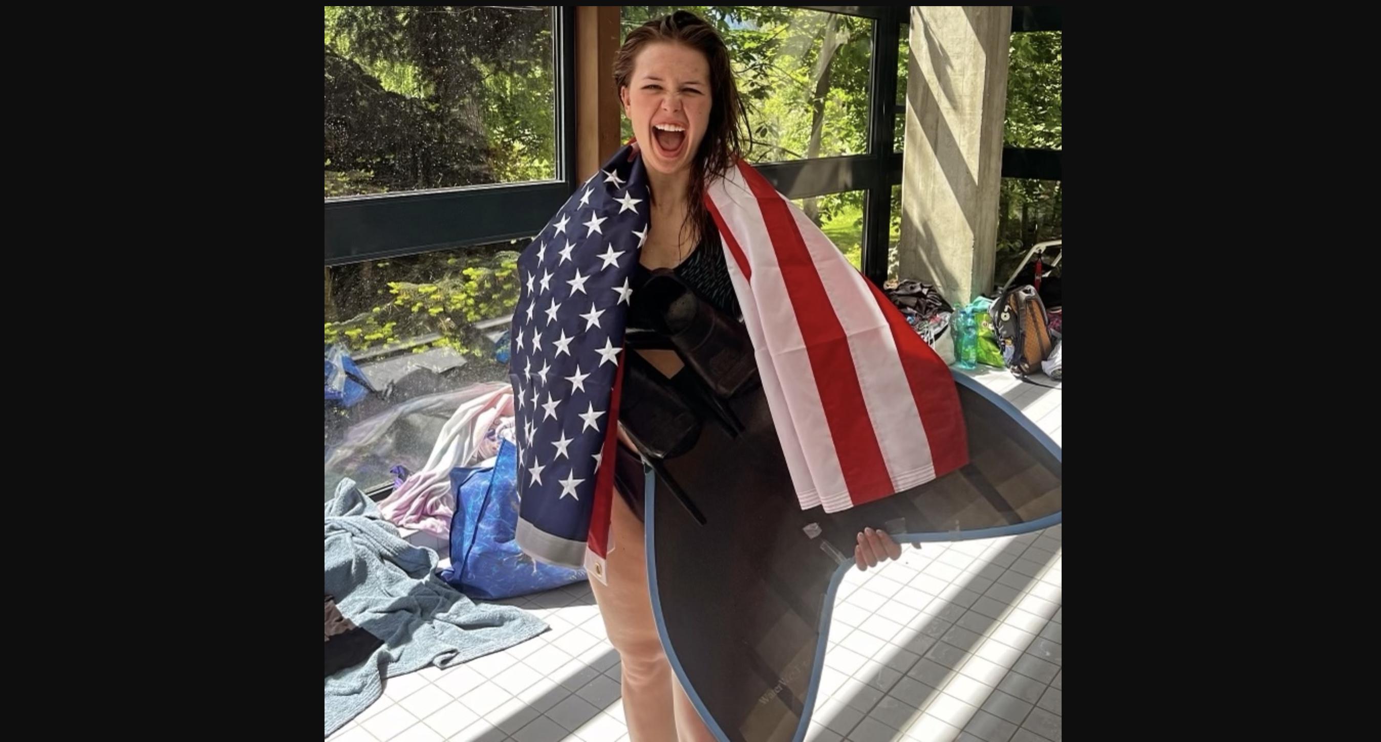 Mermaid Mia Sim celebrates after competing in the Swiss Merlympics in Geneva, Switzerland, in May.