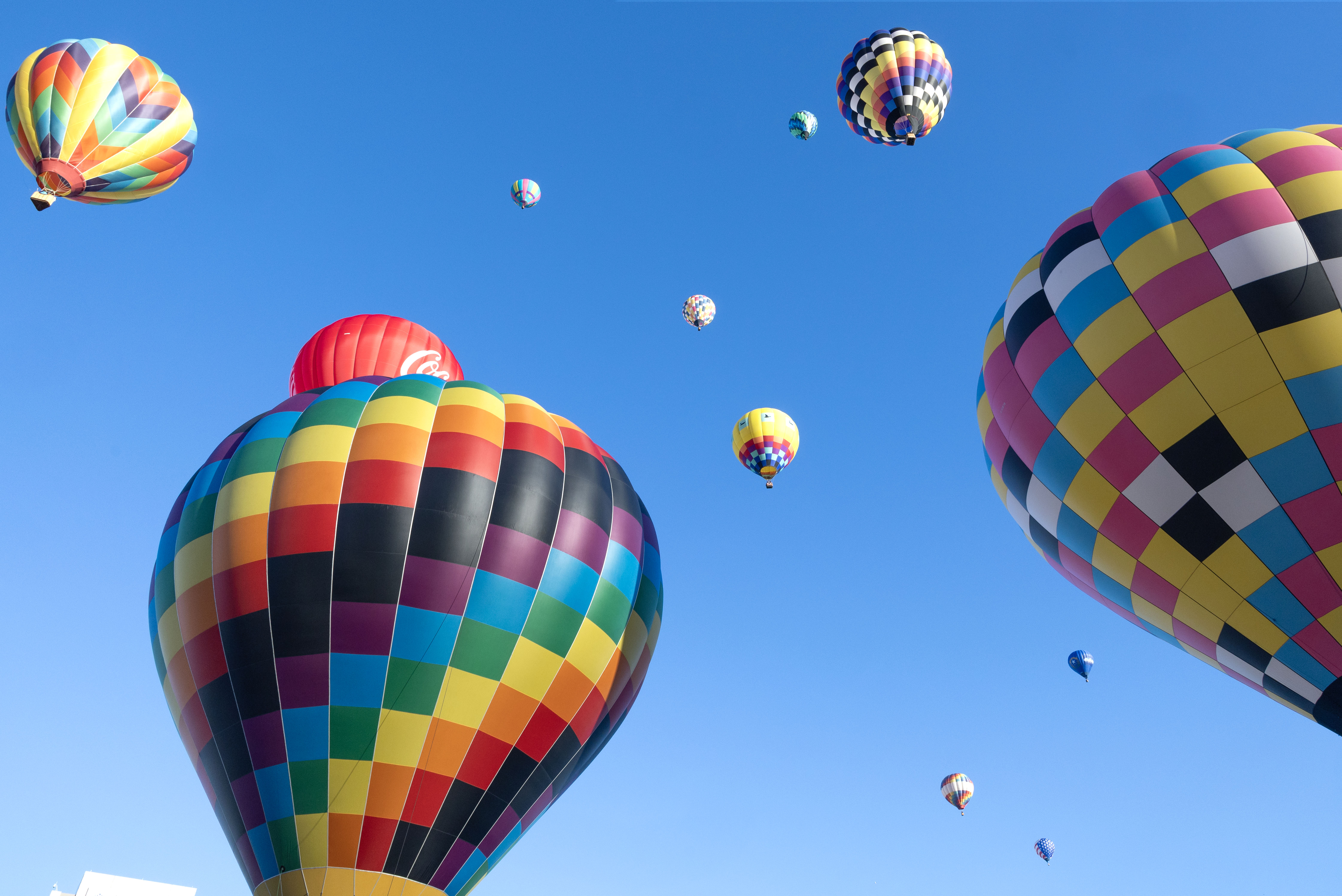 Hot air balloons rise into the sky during the Freedom Festival Balloon Fest in Provo on July 4, 2024.
