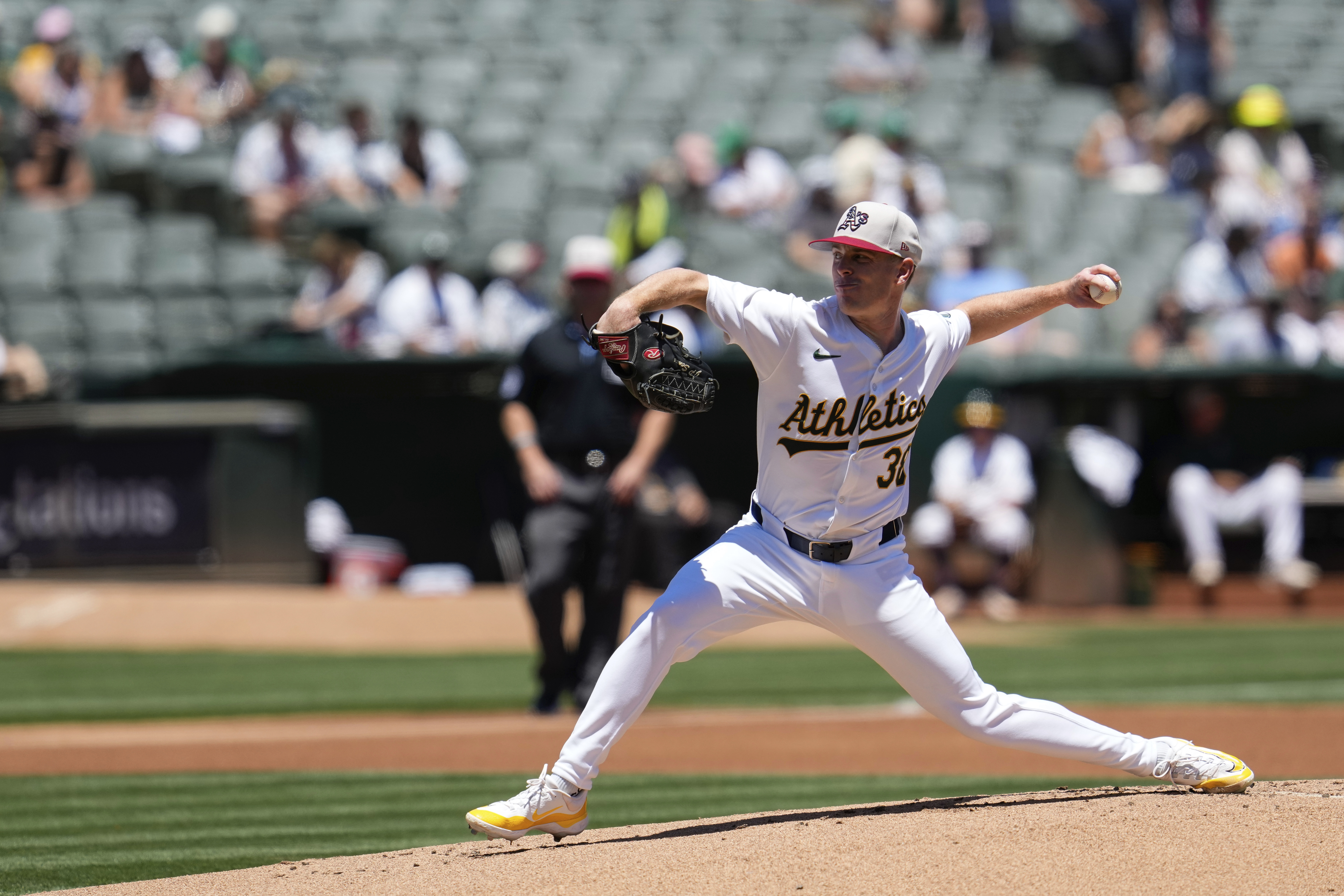 Oakland Athletics pitcher JP Sears throws to a Los Angeles Angels batter during the first inning of a baseball game Thursday, July 4, 2024, in Oakland, Calif. 