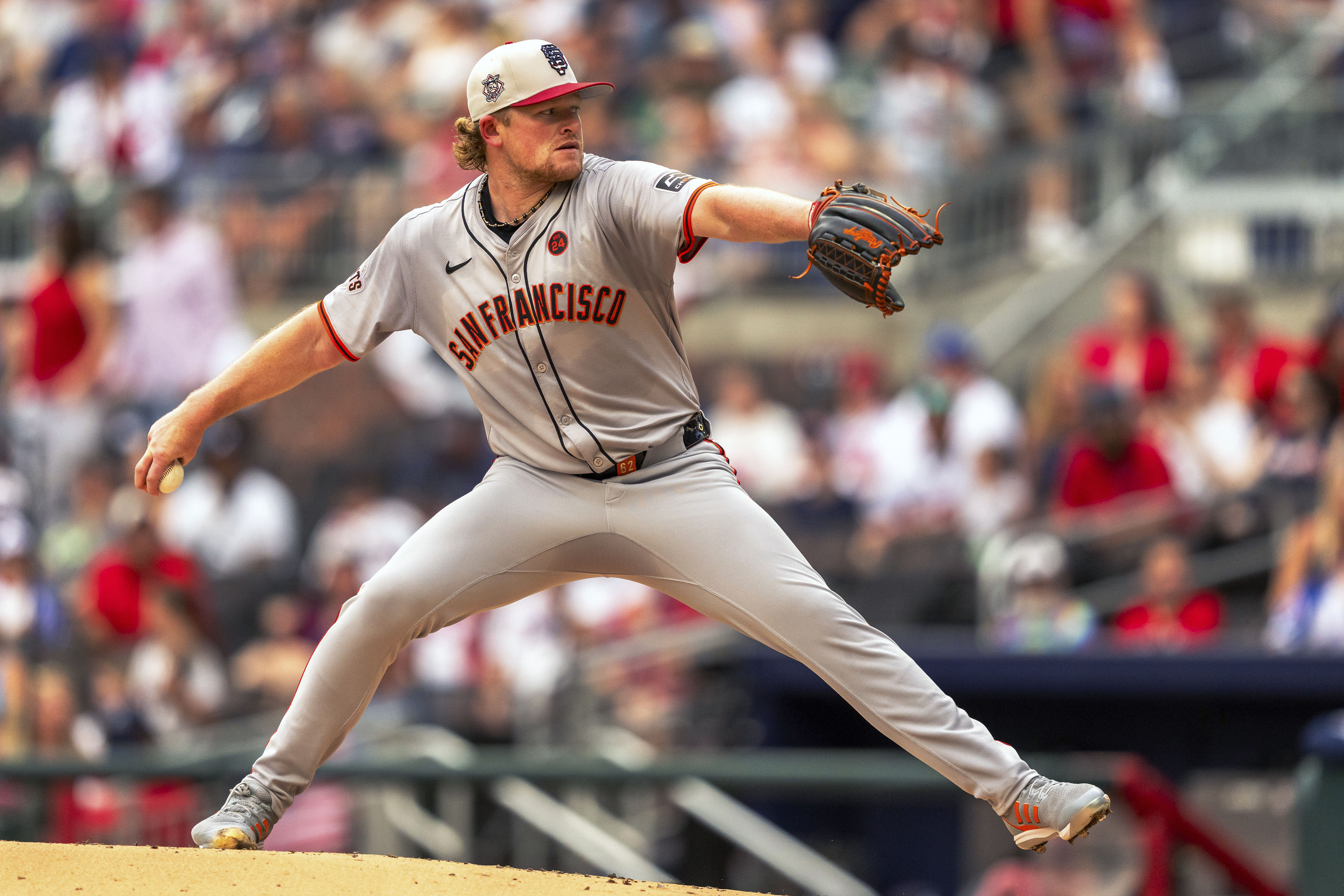 San Francisco Giants pitcher Logan Webb throws during the first inning of a baseball game against the Atlanta Braves, Thursday, July 4, 2024, in Atlanta. 