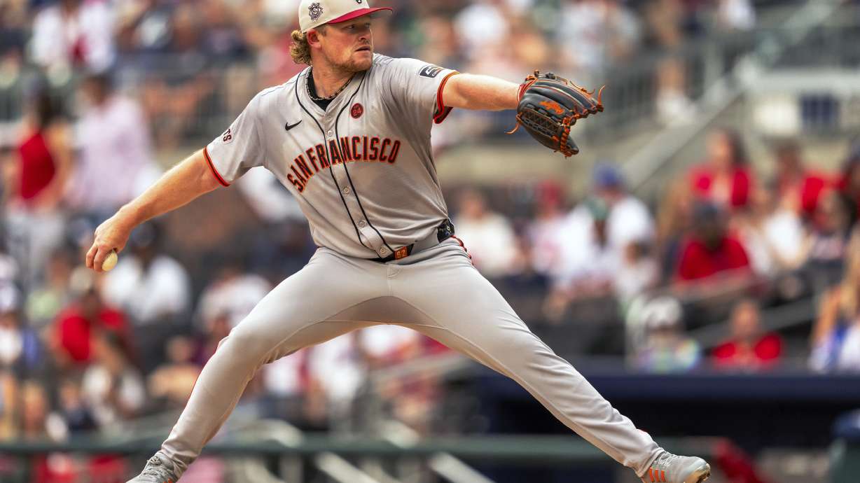 San Francisco Giants pitcher Logan Webb throws during the first inning of a baseball game against the Atlanta Braves, Thursday, July 4, 2024, in Atlanta.