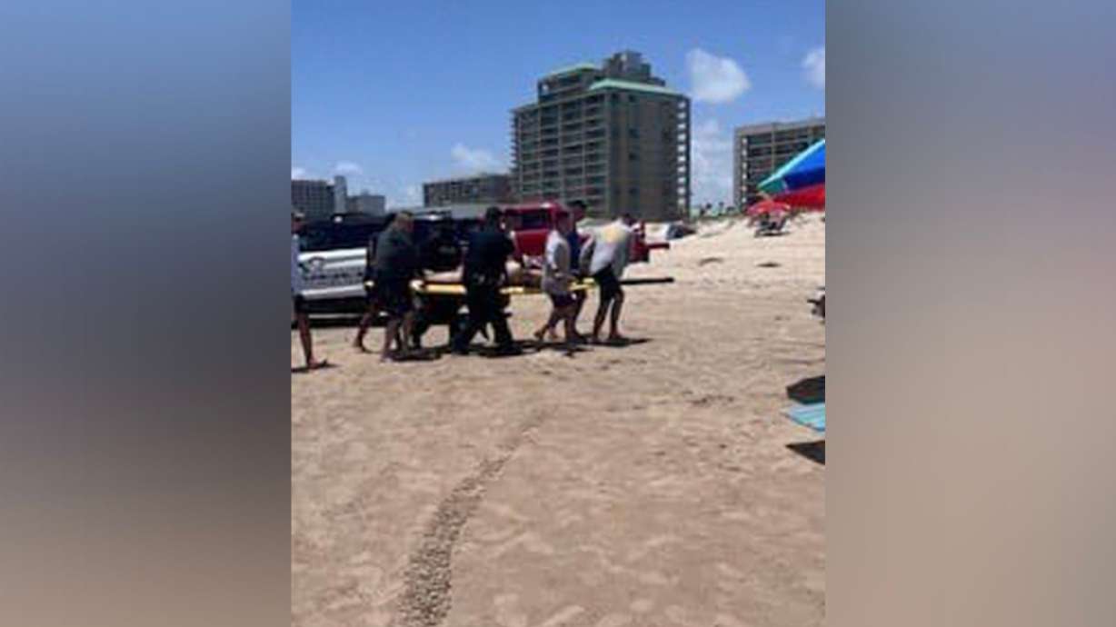 Two off-duty Border Patrol agents helped a victim of a shark attack in Texas Thursday, according to a post from the U.S. Border Patrol Laredo Sector. Several people were bitten by sharks in separate attacks in Texas and Florida.