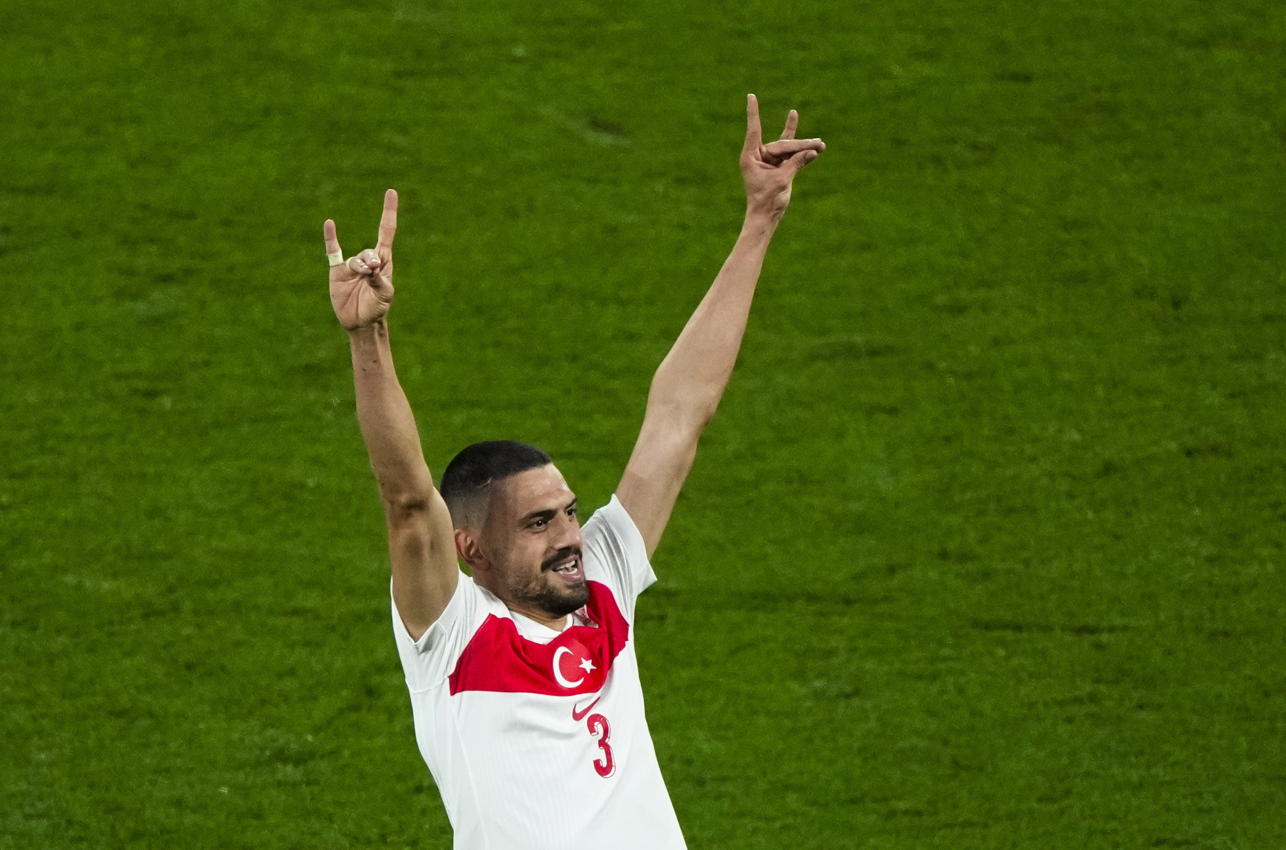 Turkey's Merih Demiral celebrates after scoring his side second goal during a round of sixteen match between Austria and Turkey at the Euro 2024 soccer tournament in Leipzig, Germany, Tuesday, July 2, 2024. UEFA has launched an investigation into Turkey soccer player Merih Demiral's “alleged inappropriate behavior” after he celebrated a goal at Euro 2024 by displaying a hand sign associated with an ultra-nationalist group. 