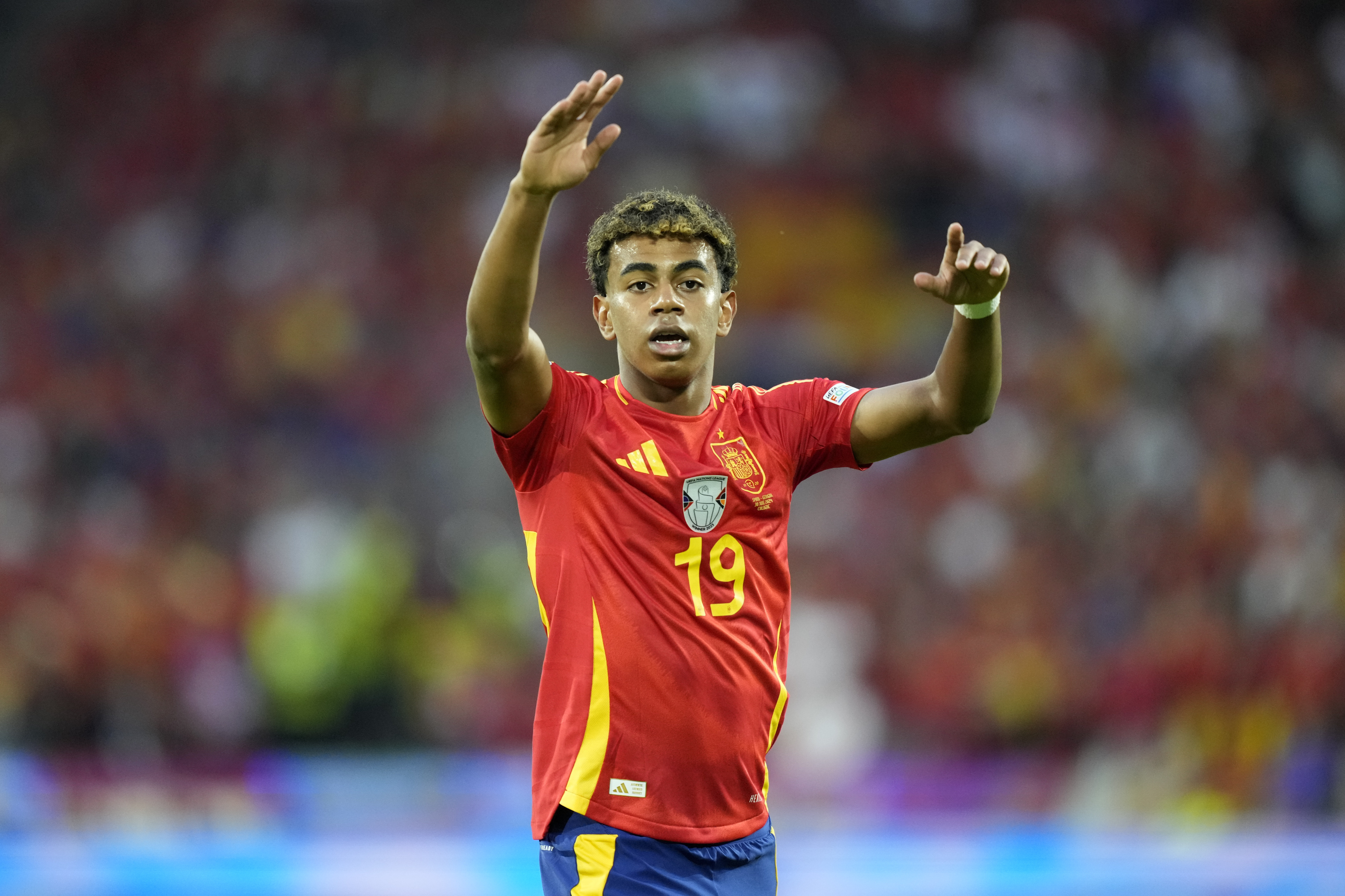 Spain's Lamine Yamal reacts on the pitch during a round of sixteen match between Spain and Georgia at the Euro 2024 soccer tournament in Cologne, Germany, Sunday, June 30, 2024.