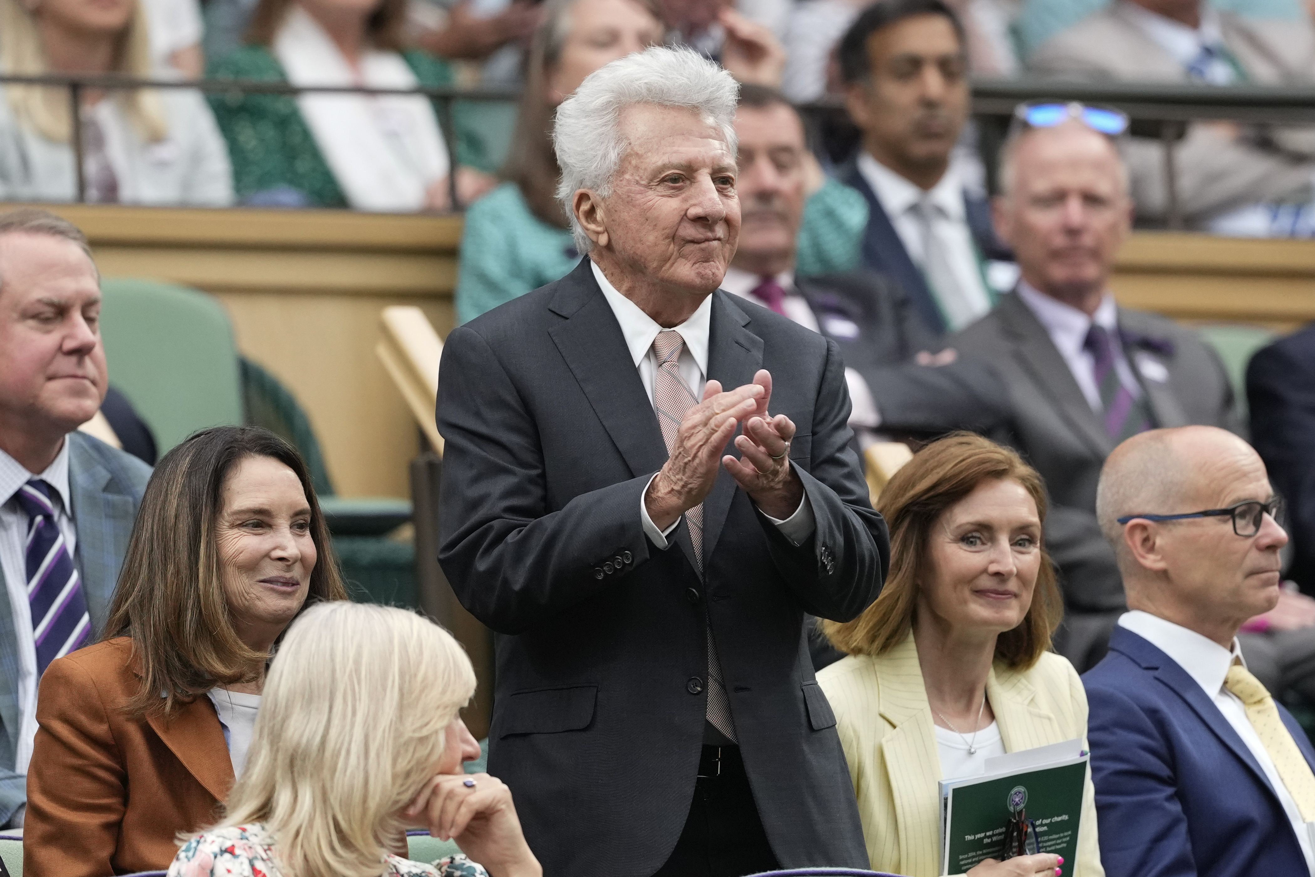 Dustin Hoffman reacts as he watches the third round match between Spain's Carlos Alcaraz and Francis Tiafoe of the United States at the Wimbledon tennis championships in London, Friday, July 5, 2024. 