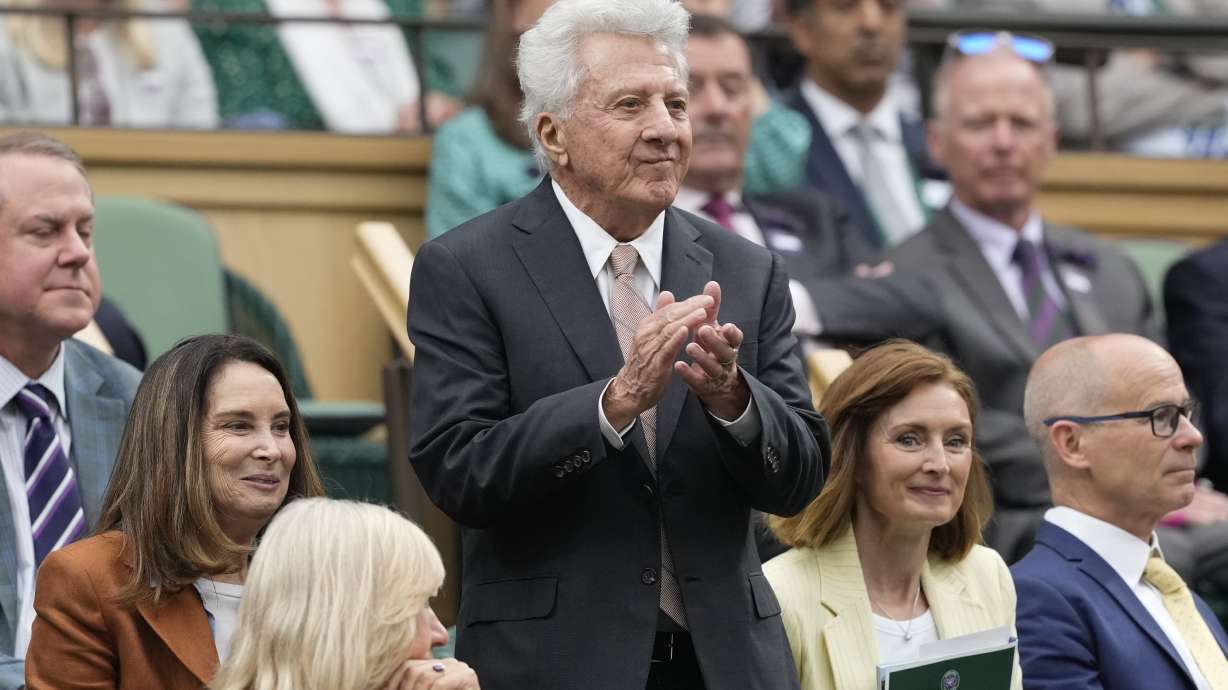 Dustin Hoffman reacts as he watches the third round match between Spain's Carlos Alcaraz and Francis Tiafoe of the United States at the Wimbledon tennis championships in London, Friday, July 5, 2024.