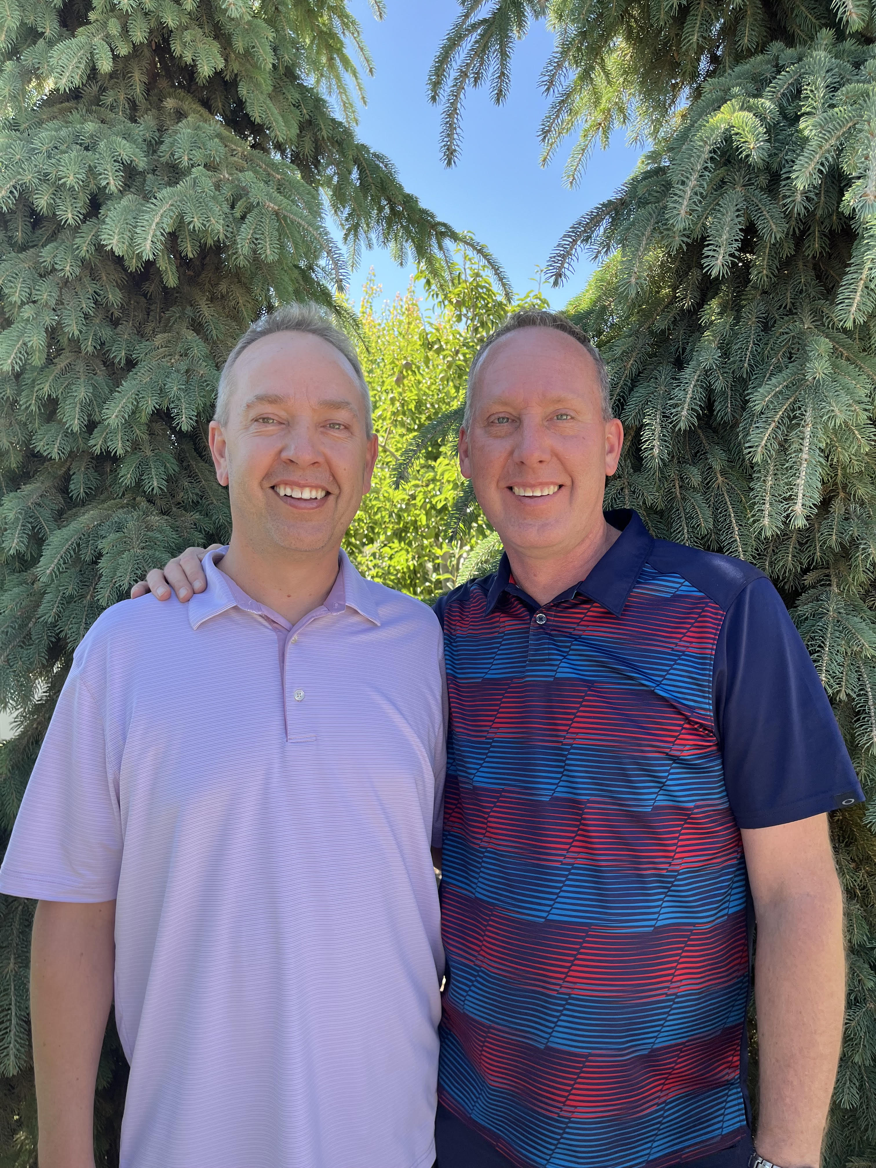 Kevin Clegg, left, poses for a picture with his brother and business partner, Steve Clegg.