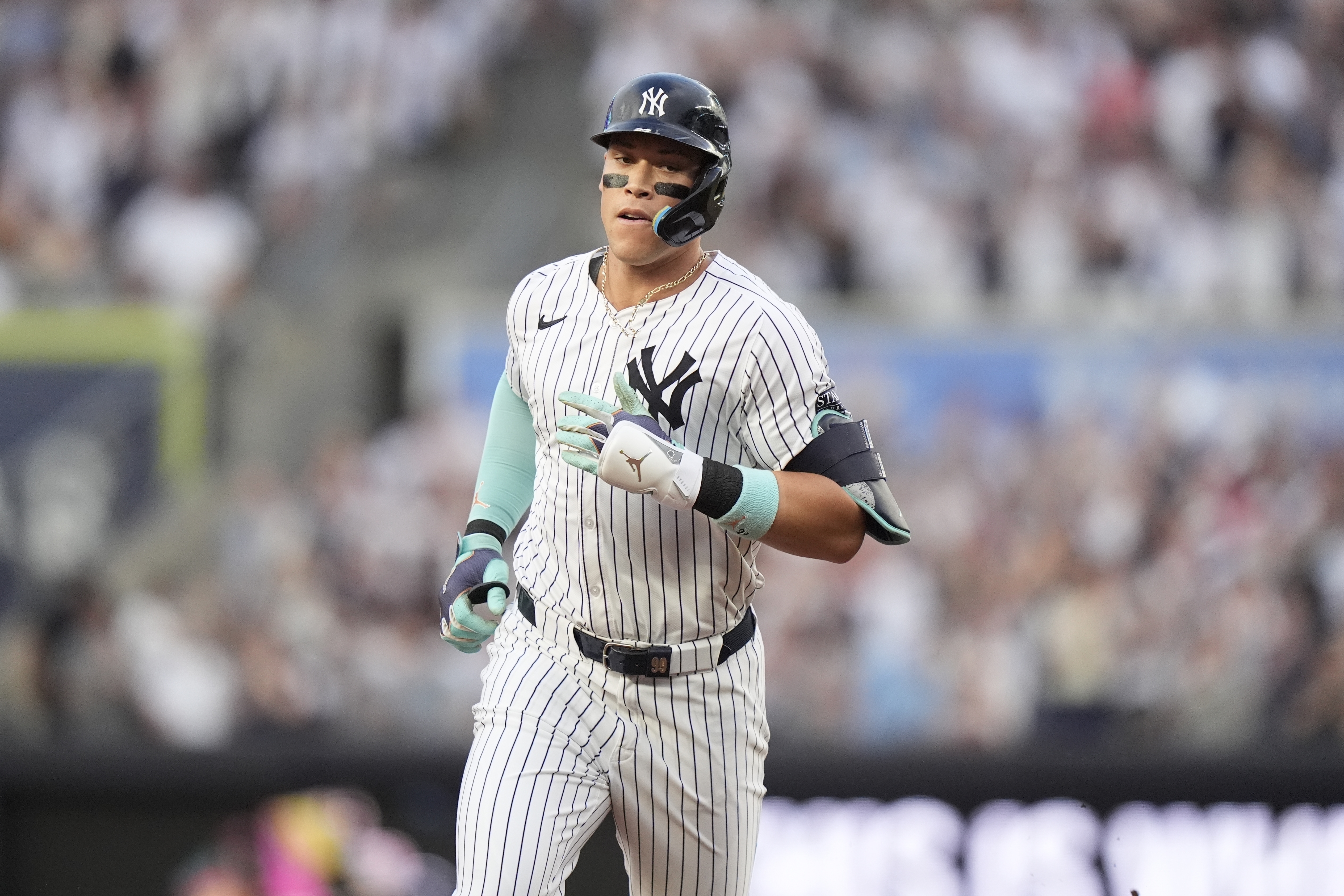 New York Yankees' Aaron Judge runs the bases after hitting a two-run home run during the first inning of a baseball game against the Atlanta Braves, Saturday, June 22, 2024, in New York. 