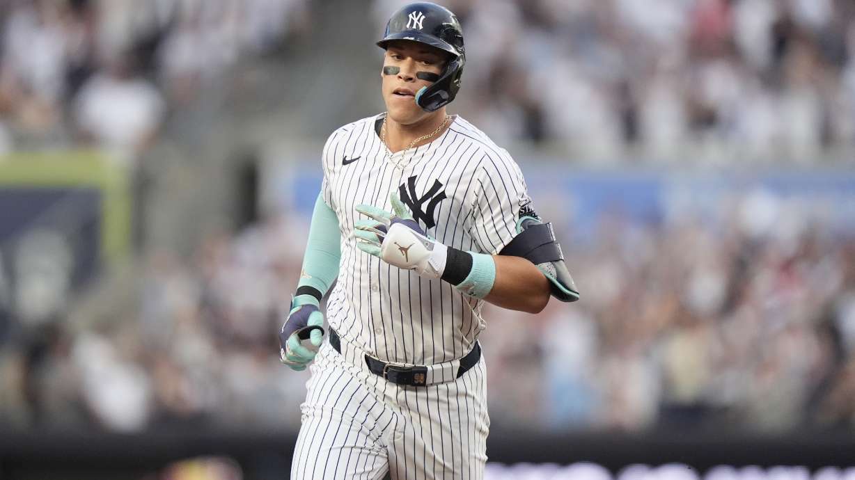 New York Yankees' Aaron Judge runs the bases after hitting a two-run home run during the first inning of a baseball game against the Atlanta Braves, Saturday, June 22, 2024, in New York.
