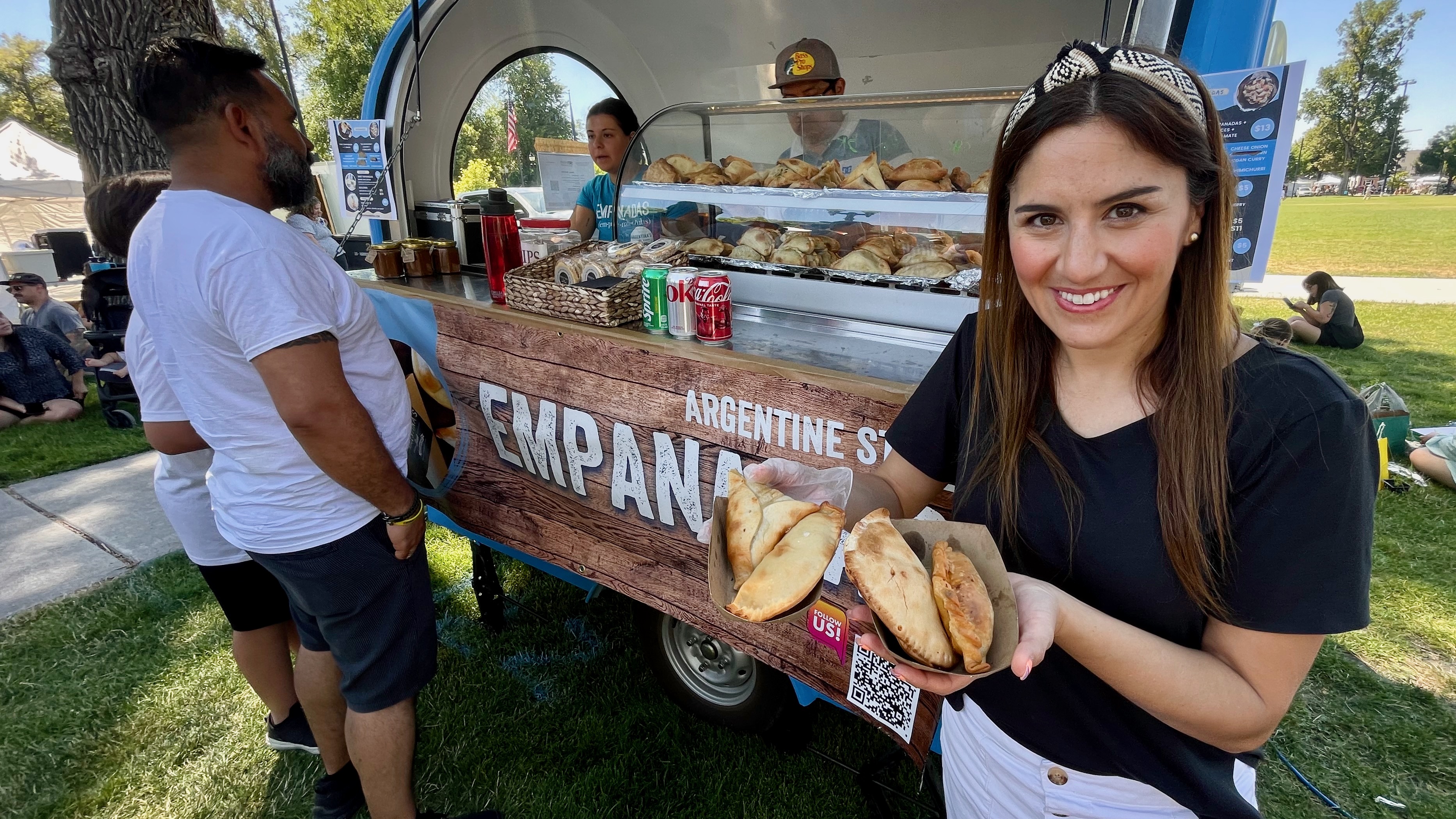 Ana Valdemoros, operator of Argentina's Best Empanadas, shows off some of her empanadas at the Downtown Farmers Market in Salt Lake City on June 22.