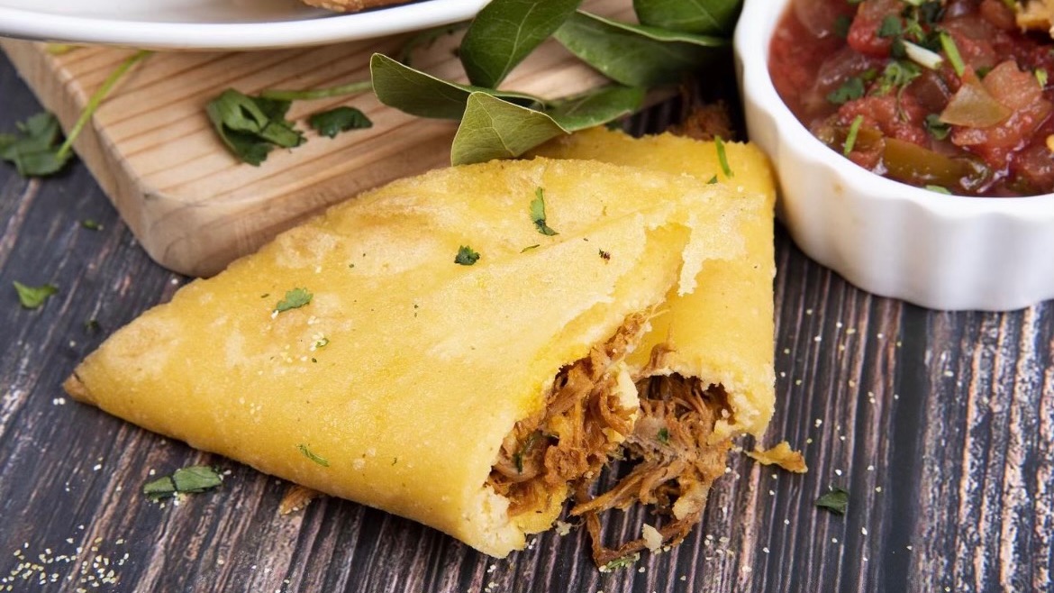 A Venezuelan-style empanada from Delicius, a Venezuelan eatery based in Salt Lake City that operates at area farmers markets.