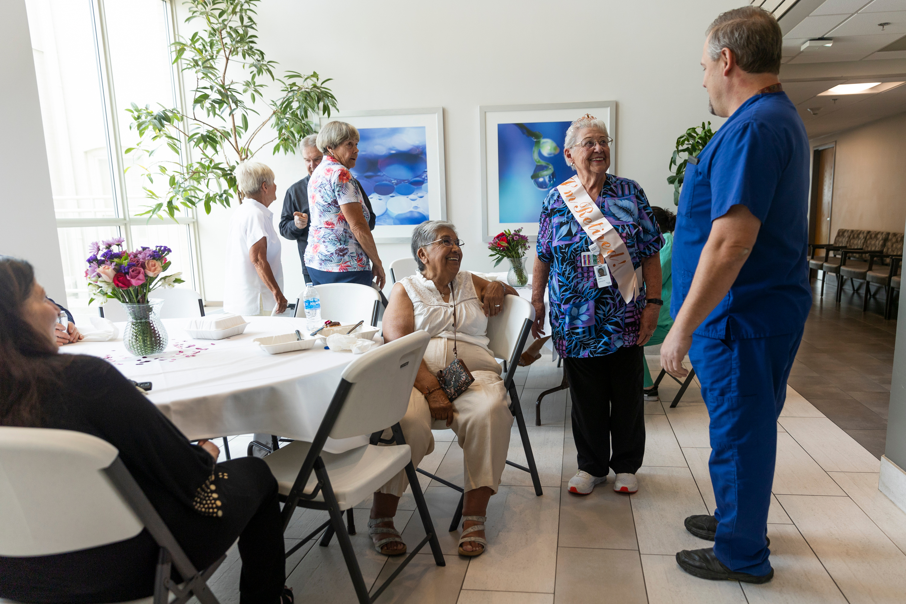 Wilene Lowther, often referred to as “Willy,” celebrates with friends and co-workers, past and present, her retirement from CommonSpirit Holy Cross Hospital after 65 years of service at Holy Cross in Salt Lake City on Monday.