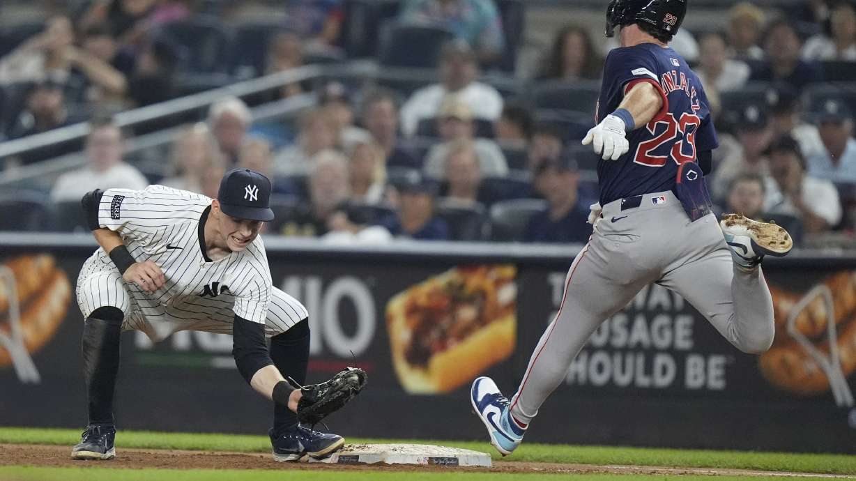 Boston Red Sox's Romy Gonzalez (23) is thrown out at first base by New York Yankees pitcher Luke Weaver as Yankees' Ben Rice, left, catches the ball during the seventh inning of a baseball game, Friday, July 5, 2024, in New York.