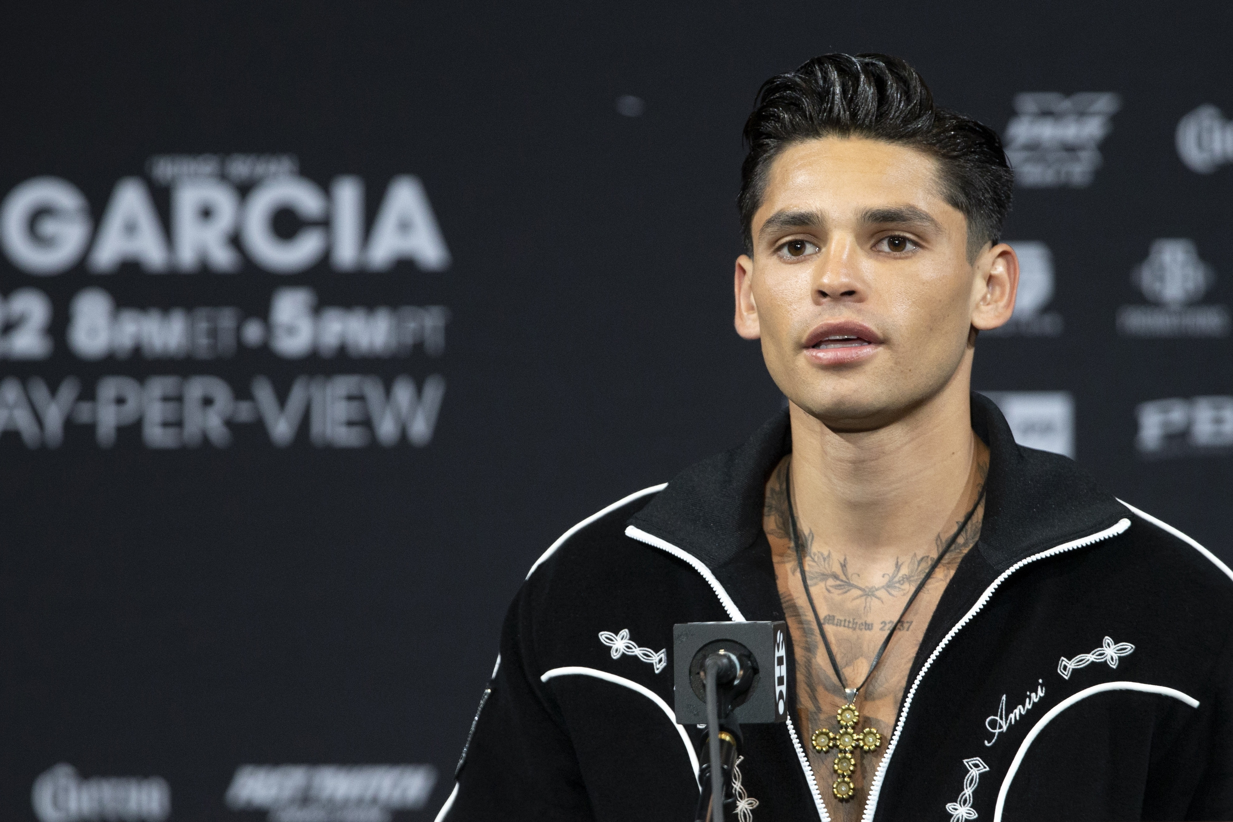 FILE - Super lightweight boxer Ryan Garcia speaks during a news conference at the MGM Grand hotel-casino Thursday, April 20, 2023, in Las Vegas. Ryan Garcia was expelled by the World Boxing Council on Thursday after he repeatedly used racial slurs against Black people and disparaged Muslims in comments livestreamed on social media. 
