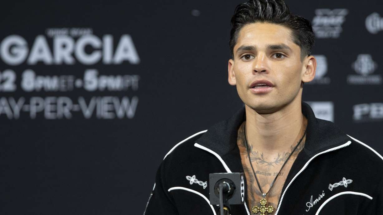 FILE - Super lightweight boxer Ryan Garcia speaks during a news conference at the MGM Grand hotel-casino Thursday, April 20, 2023, in Las Vegas. Ryan Garcia was expelled by the World Boxing Council on Thursday after he repeatedly used racial slurs against Black people and disparaged Muslims in comments livestreamed on social media.