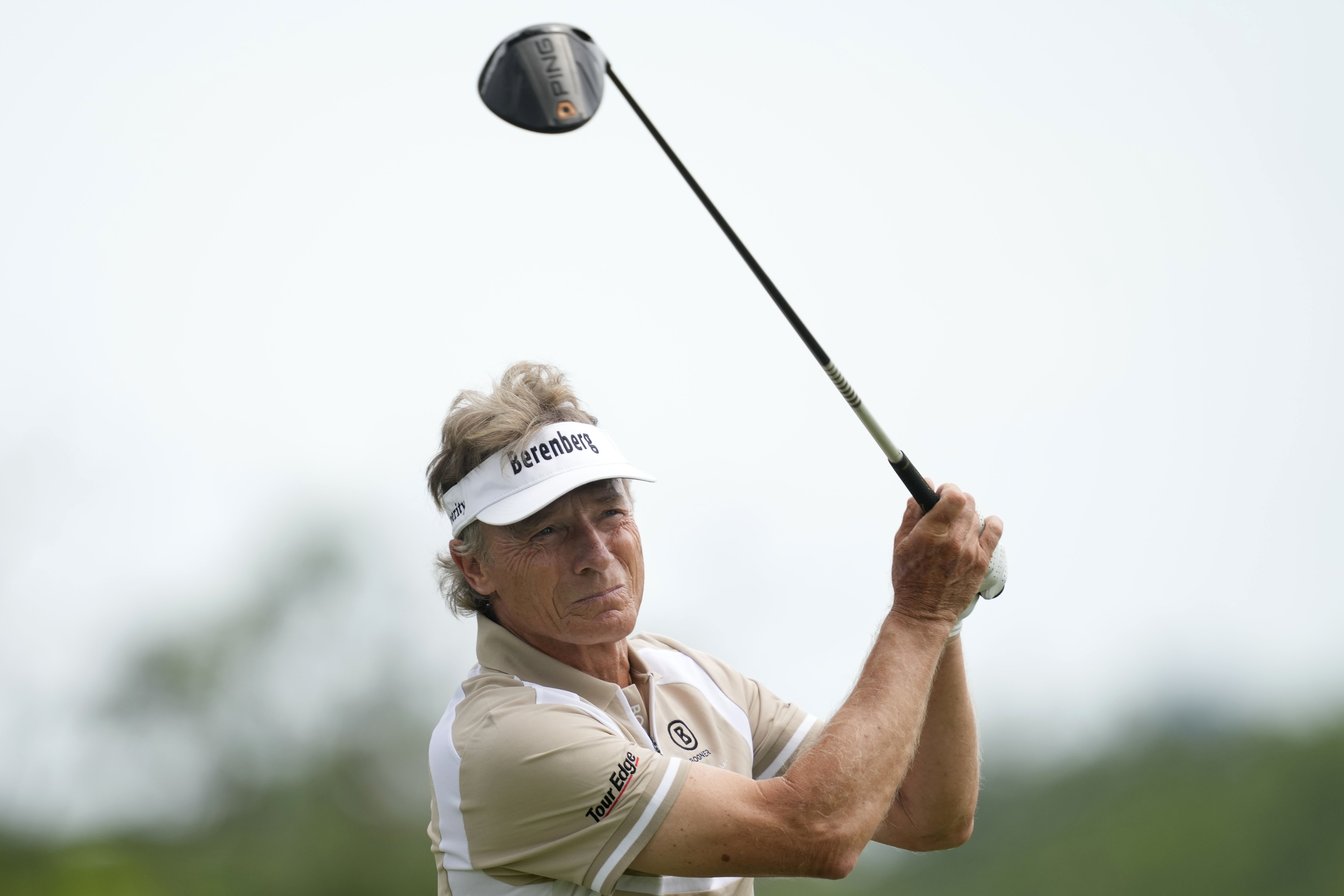 FILE - Bernhard Langer hits off the third tee during the final round of the Champions Tour Principal Charity Classic golf tournament, June 2, 2024, in Des Moines, Iowa. Bernhard Langer has bid farewell to the European tour on home soil in Germany 50 years after the two-time Masters champion made his debut. The 66-year-old Langer missed the cut at the BMW International Open in Munich on Friday but says he will cherish the “wonderful memories” he’s made. 