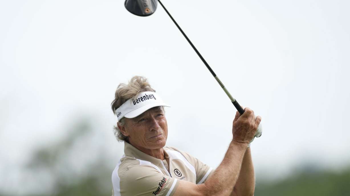 FILE - Bernhard Langer hits off the third tee during the final round of the Champions Tour Principal Charity Classic golf tournament, June 2, 2024, in Des Moines, Iowa. Bernhard Langer has bid farewell to the European tour on home soil in Germany 50 years after the two-time Masters champion made his debut. The 66-year-old Langer missed the cut at the BMW International Open in Munich on Friday but says he will cherish the “wonderful memories” he’s made.