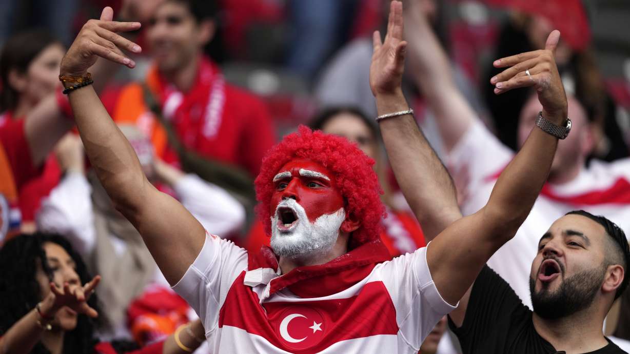 Fans cheer their Turkey's team prior a quarterfinal match between the Netherlands and Turkey at the Euro 2024 soccer tournament in Berlin, Germany, Saturday, July 6, 2024.