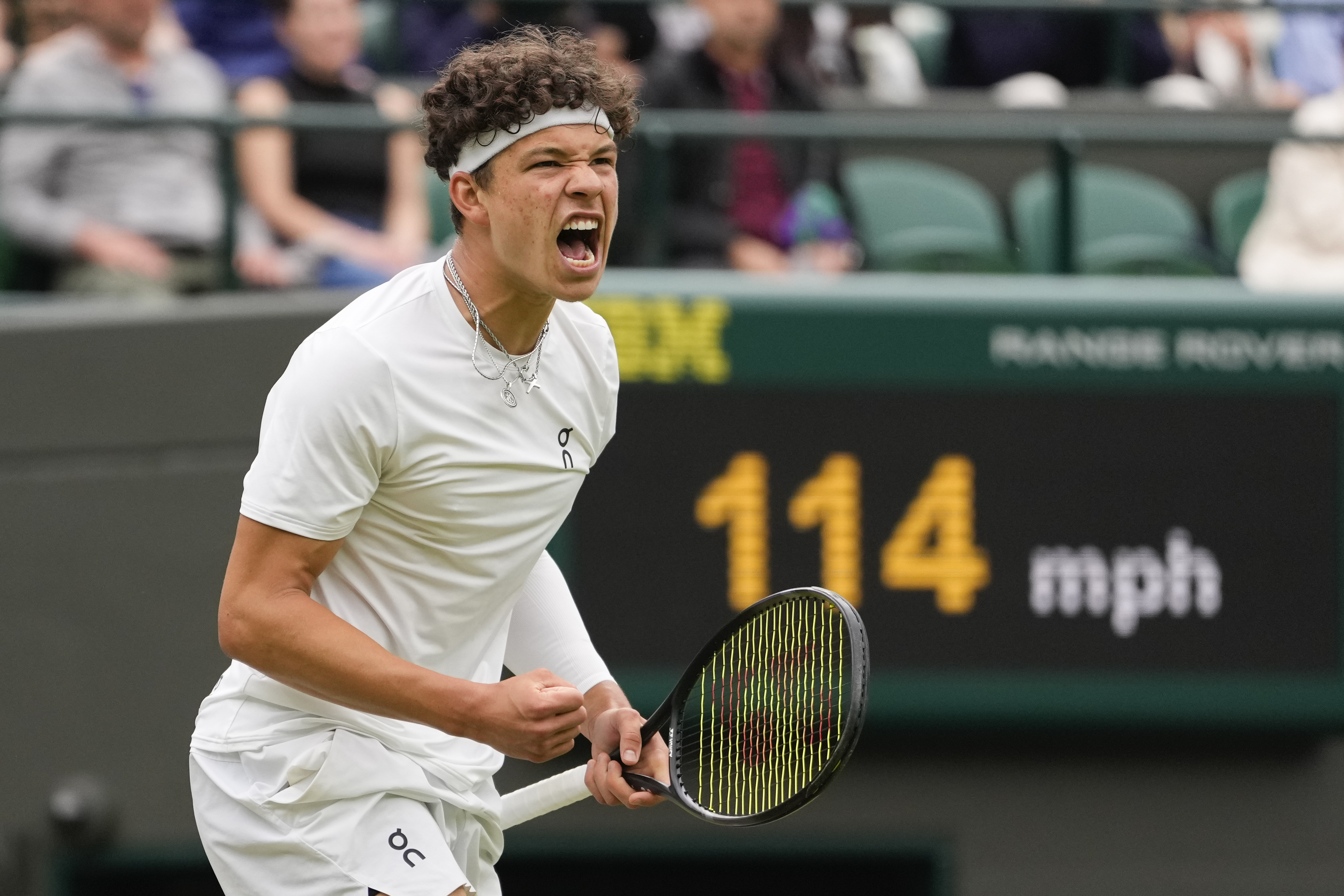 Ben Shelton of the United States reacts after winning a point against Denis Shapovalov of Canada during their third round match at the Wimbledon tennis championships in London, Saturday, July 6, 2024.