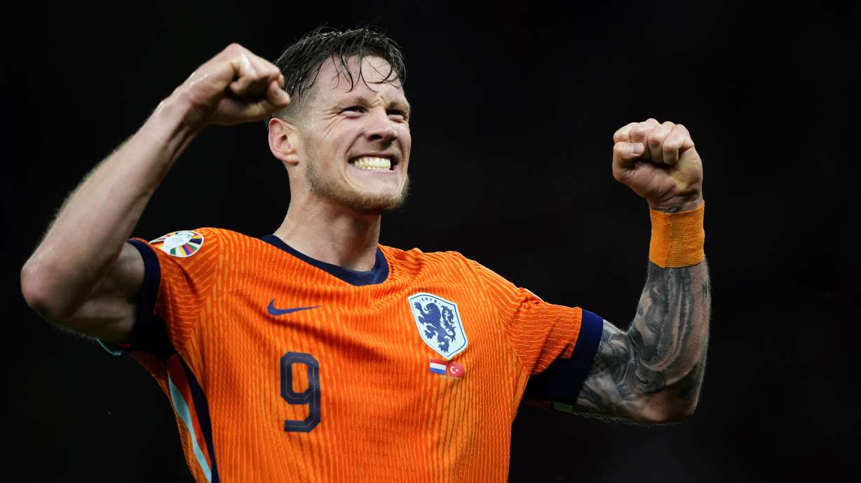 Wout Weghorst of the Netherlands celebrate at the end of a quarterfinal match between the Netherlands and Turkey at the Euro 2024 soccer tournament in Berlin, Germany, Saturday, July 6, 2024.
