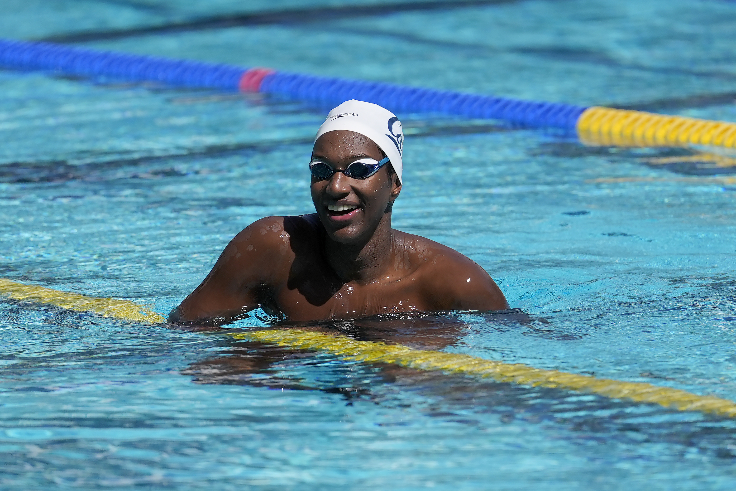Ziyad Saleem smiles while being interviewed in Berkeley, Calif., Tuesday, May 28, 2024. Saleem, a University of California swimmer, is headed to the Paris Olympics to swim for Sudan, his parents' home country and one almost all of his relatives have now fled because of war and a massive humanitarian crisis. 