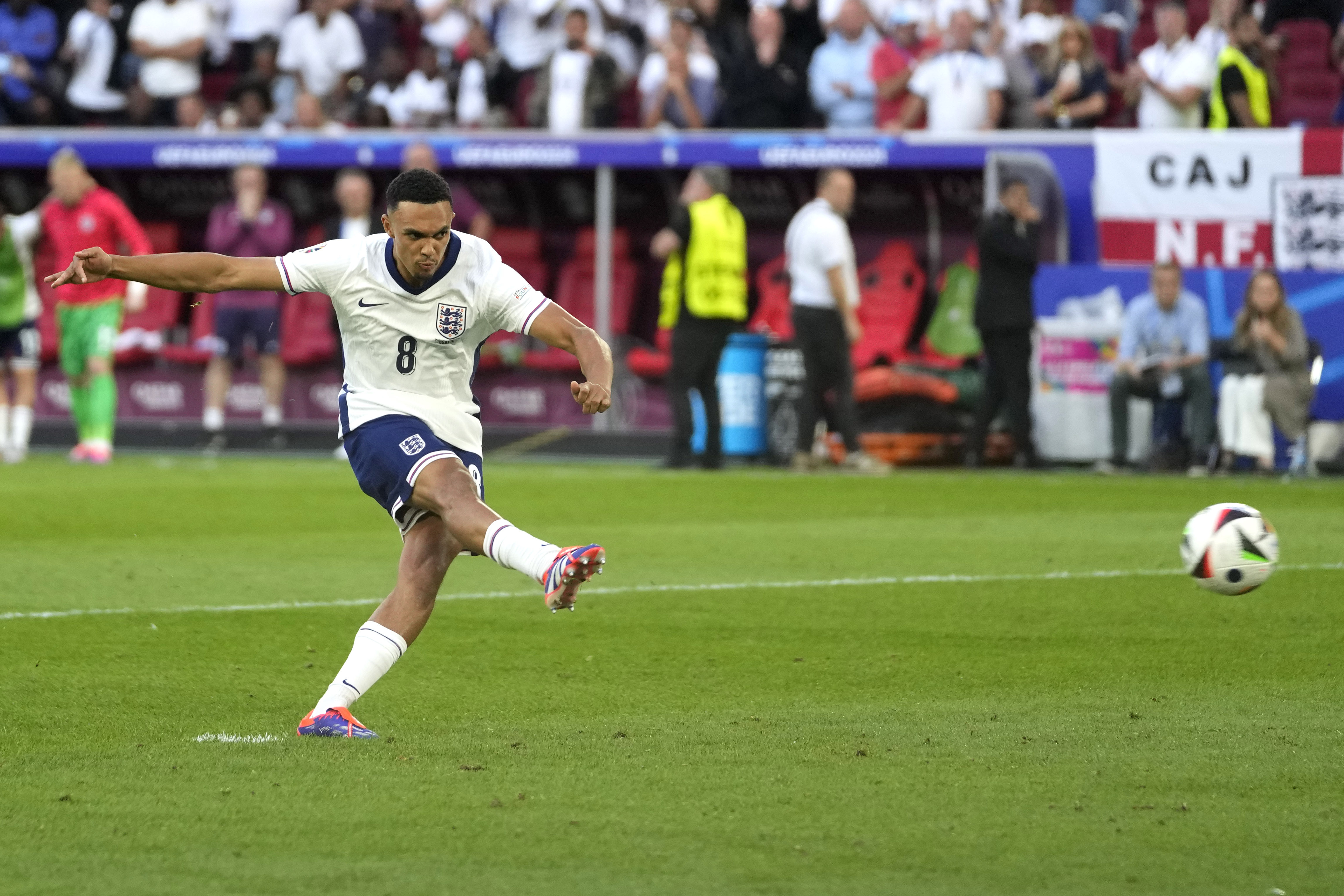 England's Trent Alexander-Arnold scores during the penalty shootout during a quarterfinal match between England and Switzerland at the Euro 2024 soccer tournament in Duesseldorf, Germany, Saturday, July 6, 2024. 