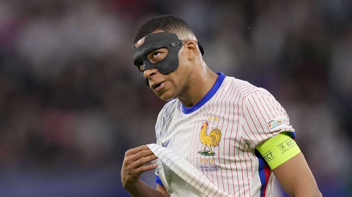 Kylian Mbappe of France reacts after missing an opportunity during a quarter final match between Portugal and France at the Euro 2024 soccer tournament in Hamburg, Germany, Friday, July 5, 2024.